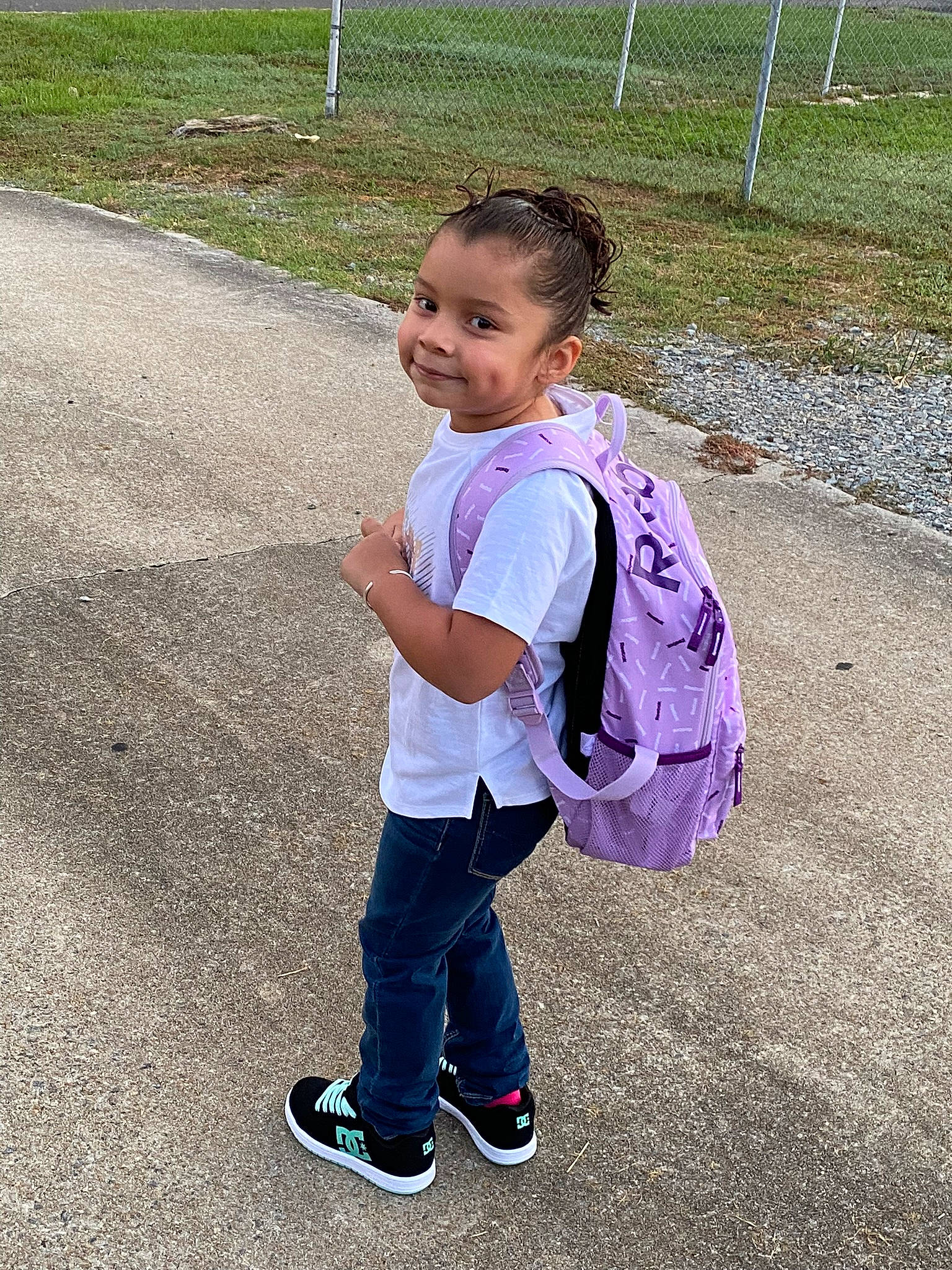 Felicity is registered to the contest to win money with this photo: asphalt, denim, electric_blue, eye, fun, grass, happy, human_body, joy, leisure, luggage_and_bags, pattern, pedestrian, people_in_nature, person, recreation, road, road_surface, sidewalk, smile