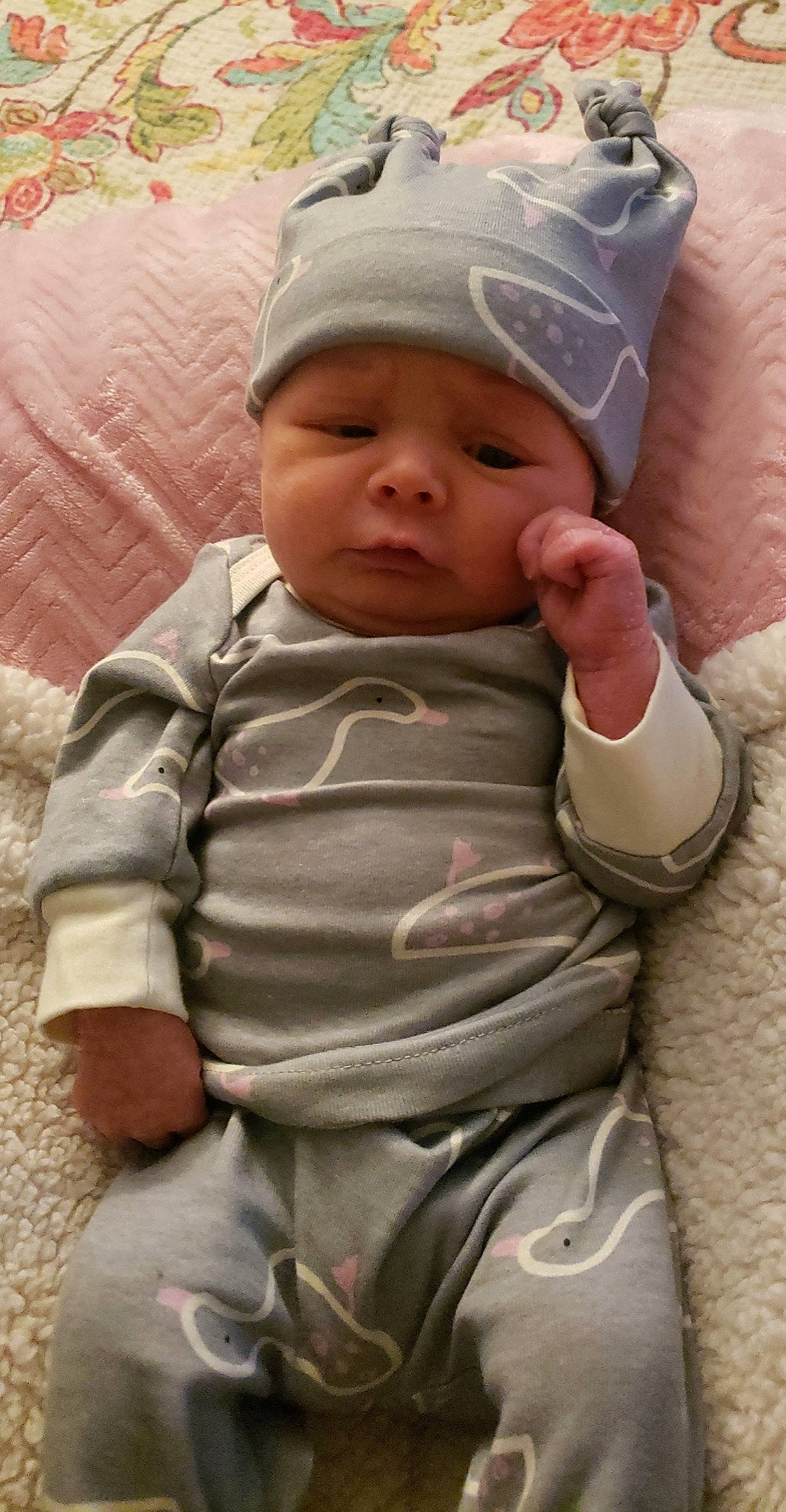 Addalynn is registered to the contest to win money with this photo: baby, baby_toddler_clothing, cap, cheek, chin, comfort, eye, face, finger, head, headwear, lip, mouth, nose, person, photograph, pink, product, skin, sleeve