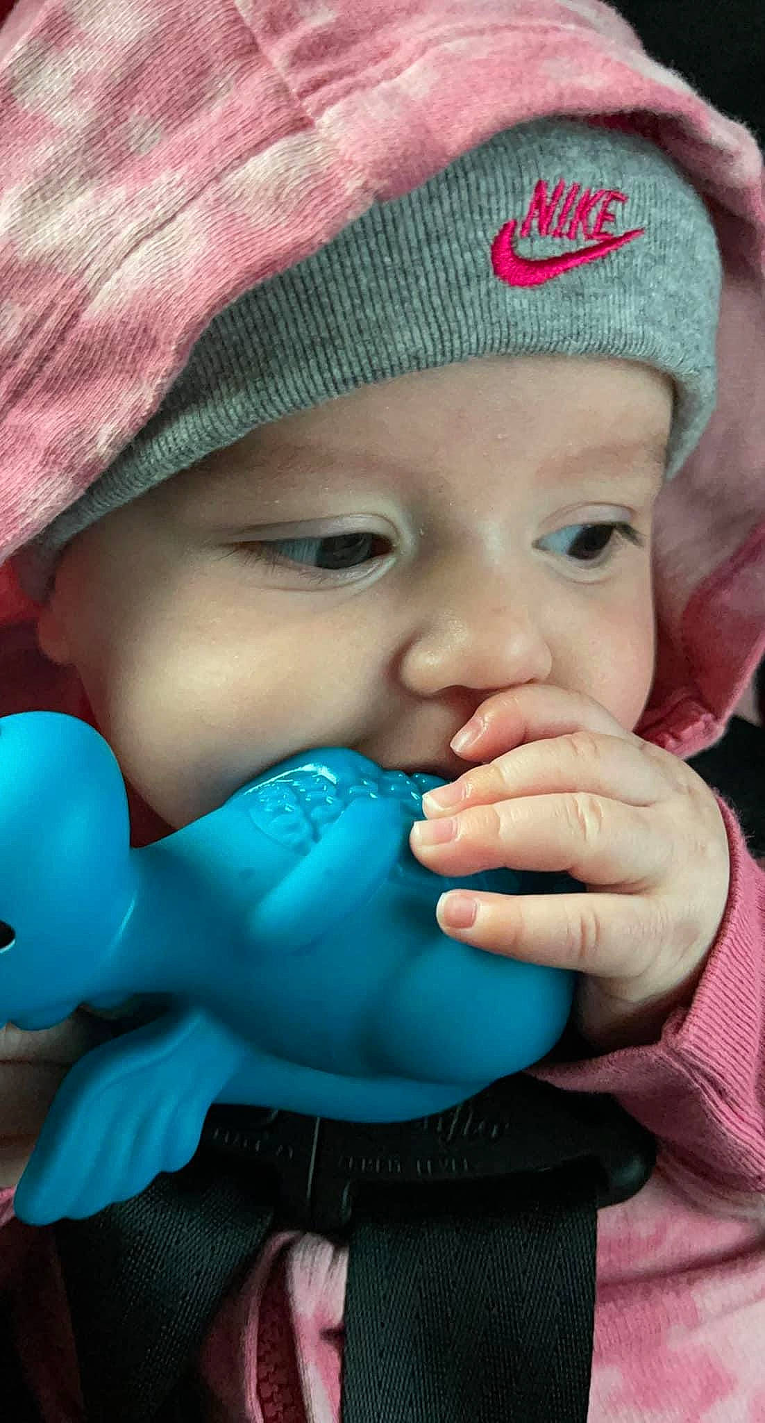 Annalia is registered to the contest to win money with this photo: baby, cap, cheek, child, facial_expression, finger, fun, gesture, hand, happy, hat, headgear, headwear, lip, mouth, nail, nose, person, pink, product