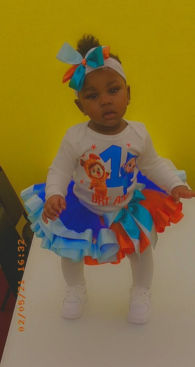 Dream joined the competition — help win amazing prizes! baby, baby_products, baby_toddler_clothing, ballet_tutu, child, costume, dance, electric_blue, entertainment, event, face, fun, happy, headgear, headwear, party_supply, pattern, person, play, sleeve