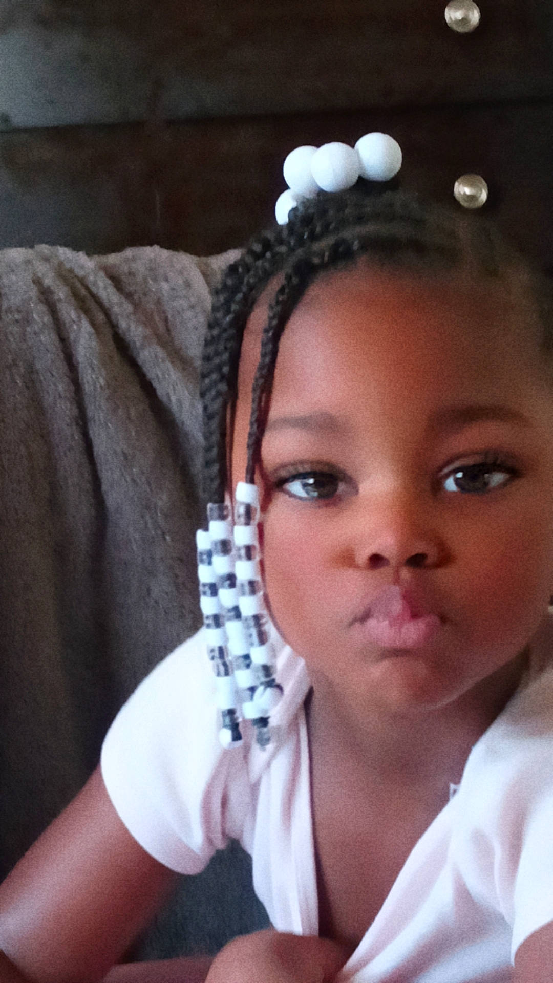 Dream is registered to the contest to win money with this photo: audio_equipment, beauty, black_hair, child, chin, ear, eyebrow, eyelash, flash_photography, forehead, gesture, hair_accessory, headgear, headpiece, jaw, jewellery, lip, long_hair, neck, nose