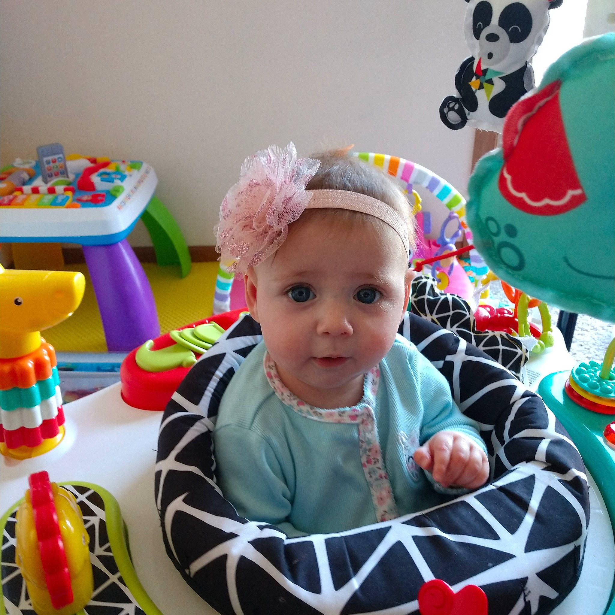 Harper is registered to the contest to win money with this photo: baby, baby_playing_with_toys, baby_products, baby_toddler_clothing, baby_toys, carmine, child, event, fun, happy, headwear, party_supply, person, photograph, pink, play, product, room, smile, snapshot