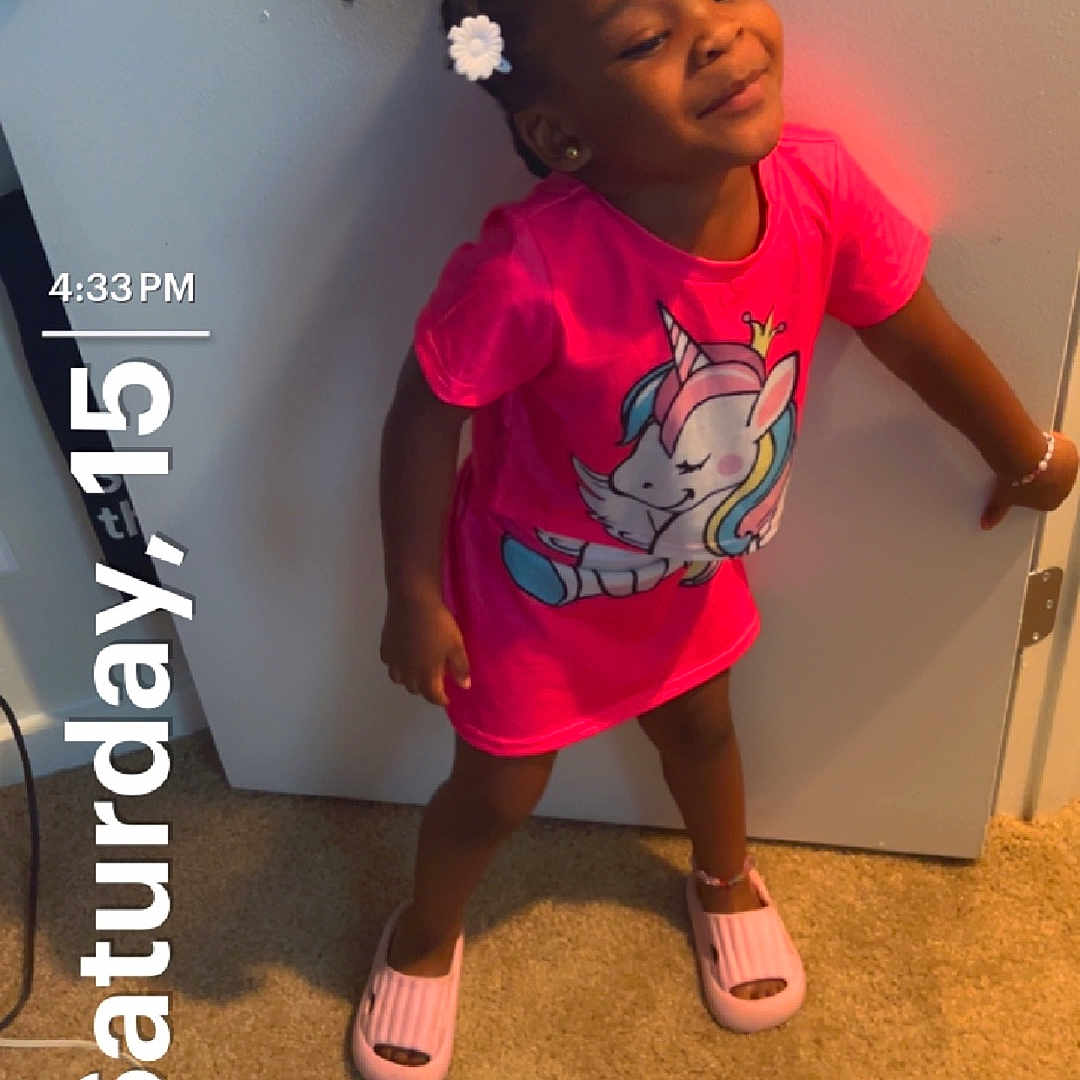 Raelynn joined the competition — help win amazing prizes! accessories, child, clothing, door, face, female, footwear, girl, head, indoors, person, photography, portrait, purple, sandal, shoe, shorts, sleeve, sneaker, t_shirt