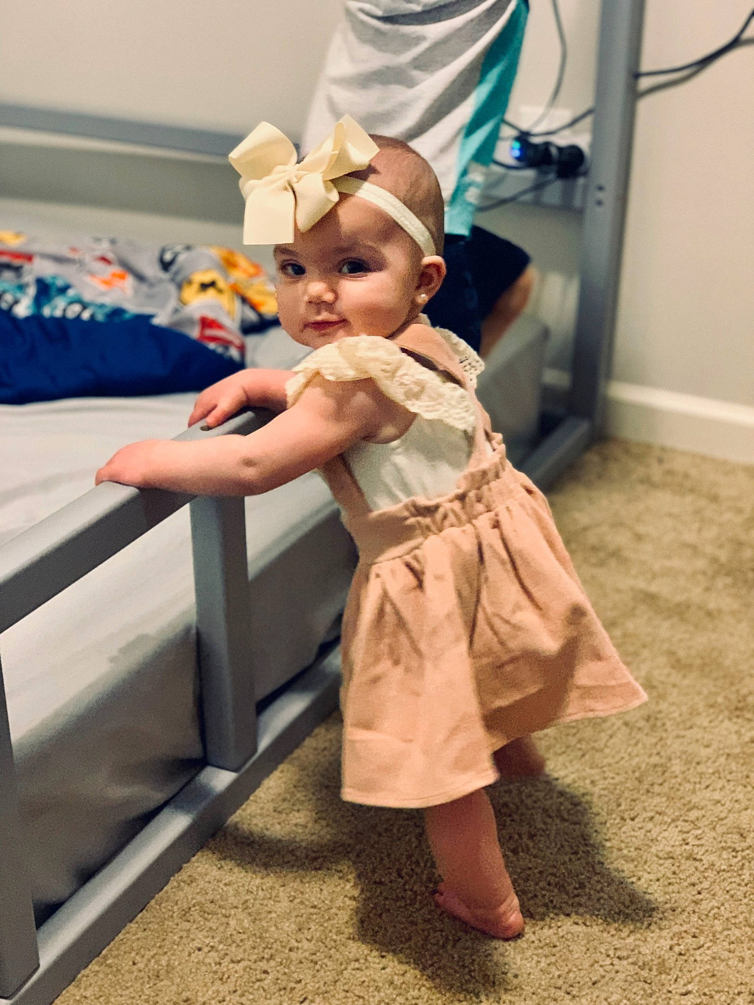 Lylah joined the competition — help win amazing prizes! baby, child, costume, curtain, dress, event, fashion_design, floor, flooring, fun, happy, hat, human_leg, one_piece_garment, person, recreation, sandal, shoulder, smile, sun_hat