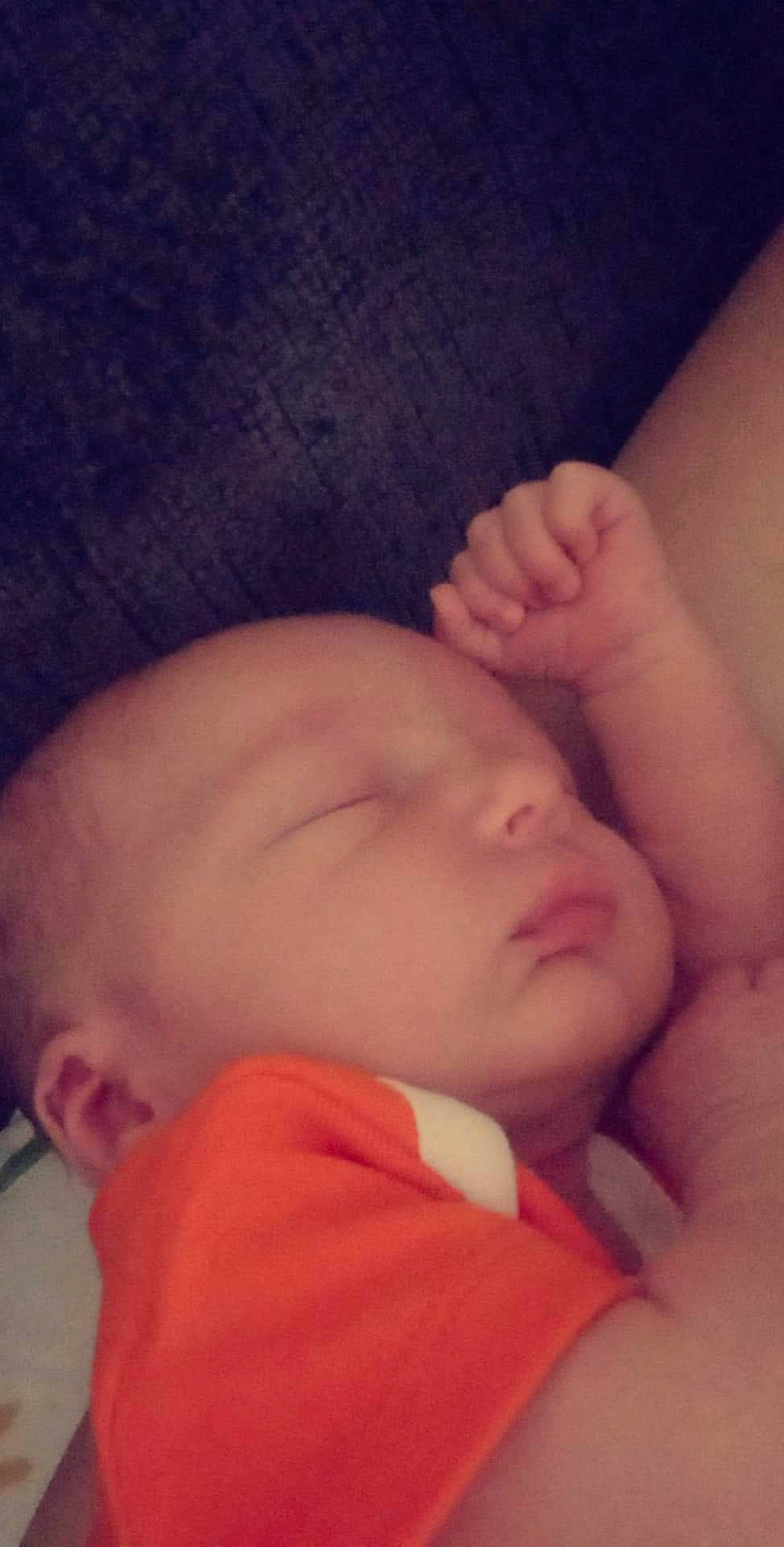 Axel joined the competition — help win amazing prizes! arm, baby, baby_sleeping, cheek, child, cloud, comfort, finger, gesture, hand, happy, lip, mouth, nail, nose, orange, person, pink, skin, thumb