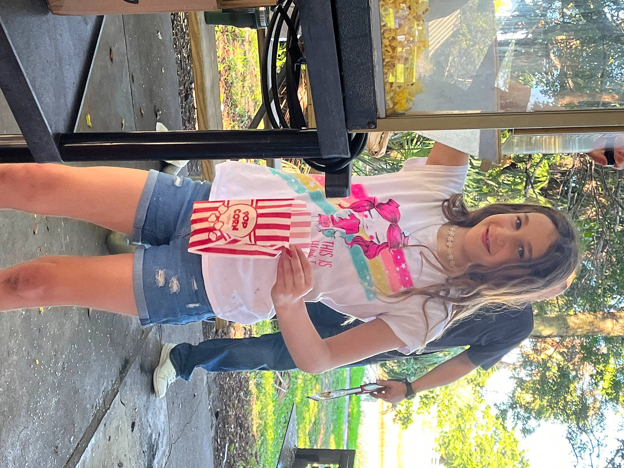 Sophia is registered to the contest to win money with this photo: arm, fashion, fun, green, happy, hat, human_leg, joy, leisure, orange, person, shorts, smile, thigh, travel, tree, vacation, wrist, yellow