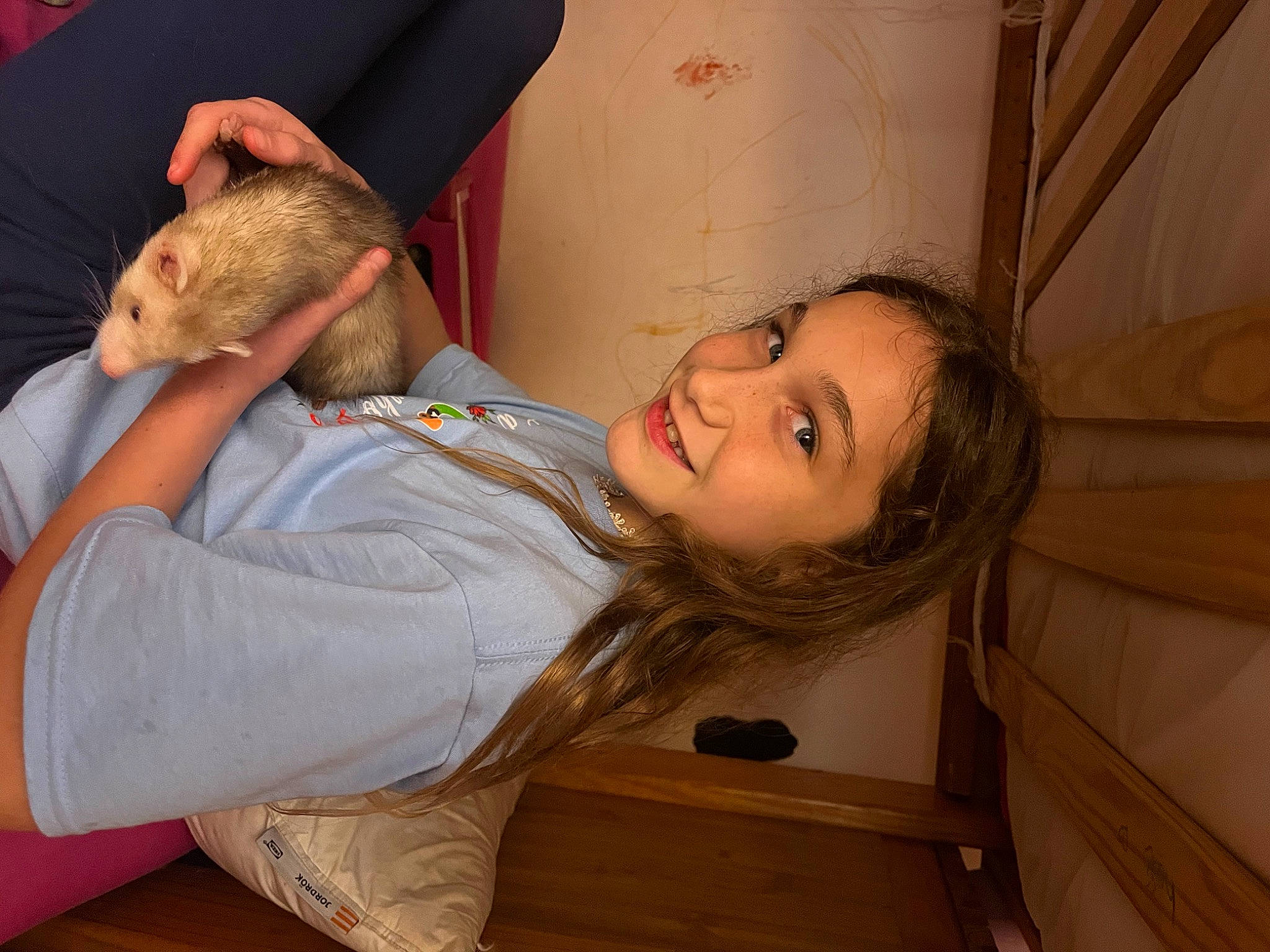 Sophia is registered to the contest to win money with this photo: child, comfort, elbow, eye, fish, flooring, fun, fur, gesture, happy, human_leg, joy, leisure, mouth, nose, person, room, sitting, skin, smile