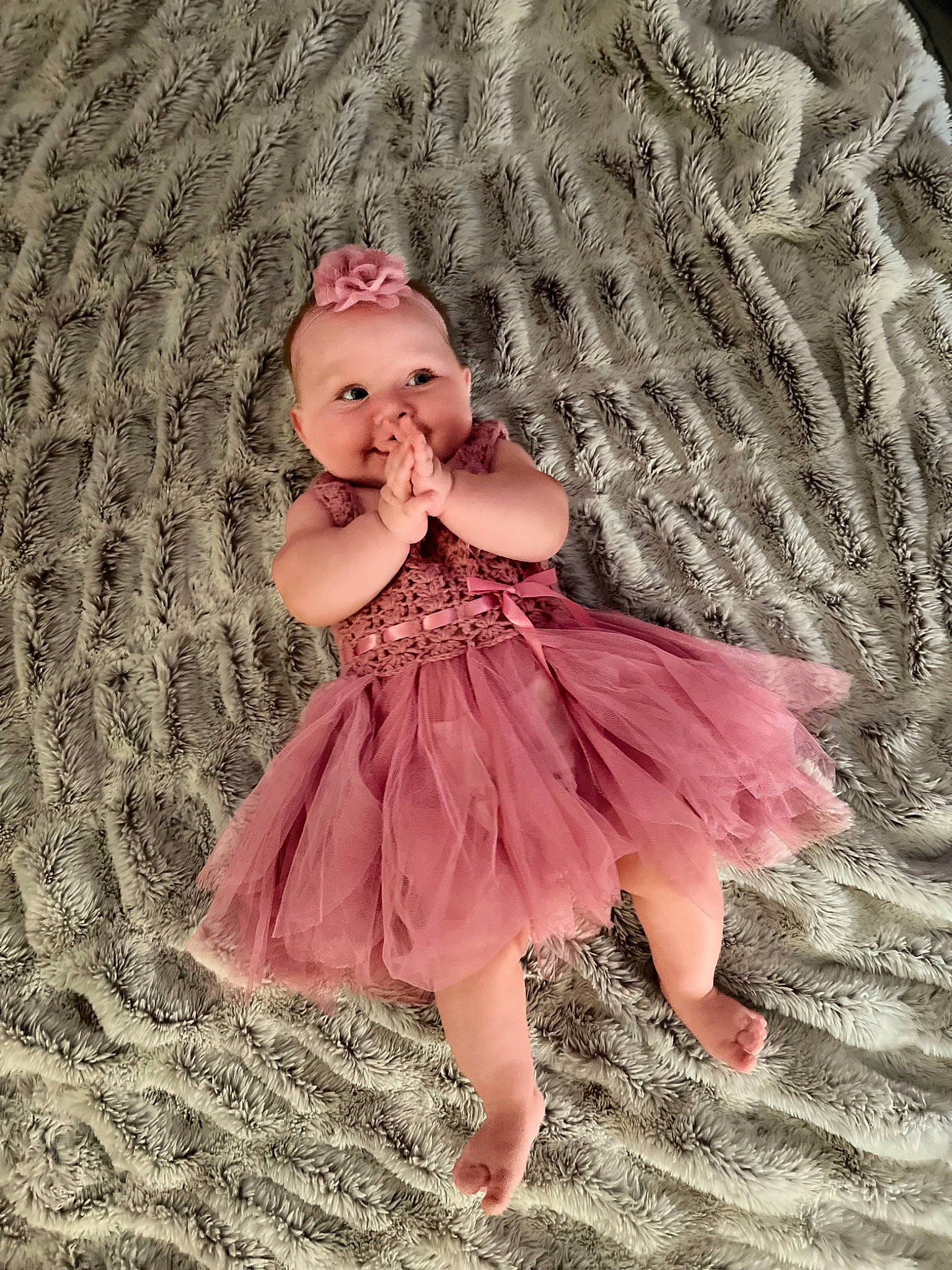 Ensley is registered to the contest to win money with this photo: baby_toddler_clothing, blond, bridal_accessory, day_dress, dress, embellishment, fashion_accessory, fashion_design, grass, hair_accessory, happy, headpiece, magenta, one_piece_garment, pattern, peach, person, pink, ruffle, sleeve