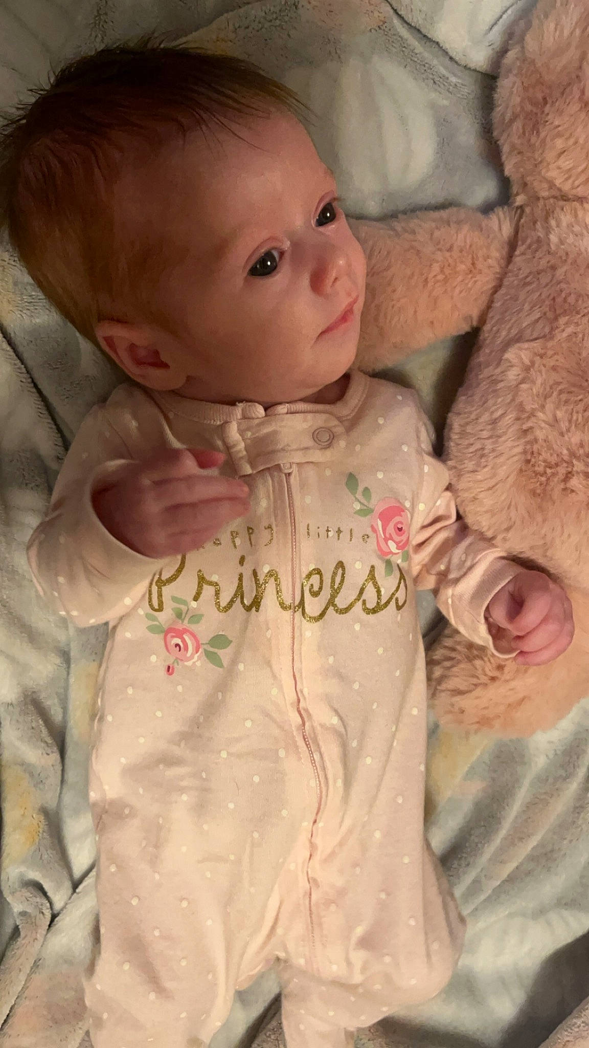 Lorelai is registered to the contest to win money with this photo: baby, baby_toddler_clothing, cheek, chin, ear, eye, forehead, gesture, hand, head, iris, lip, mouth, neck, nose, outerwear, person, pink, skin, sleeve