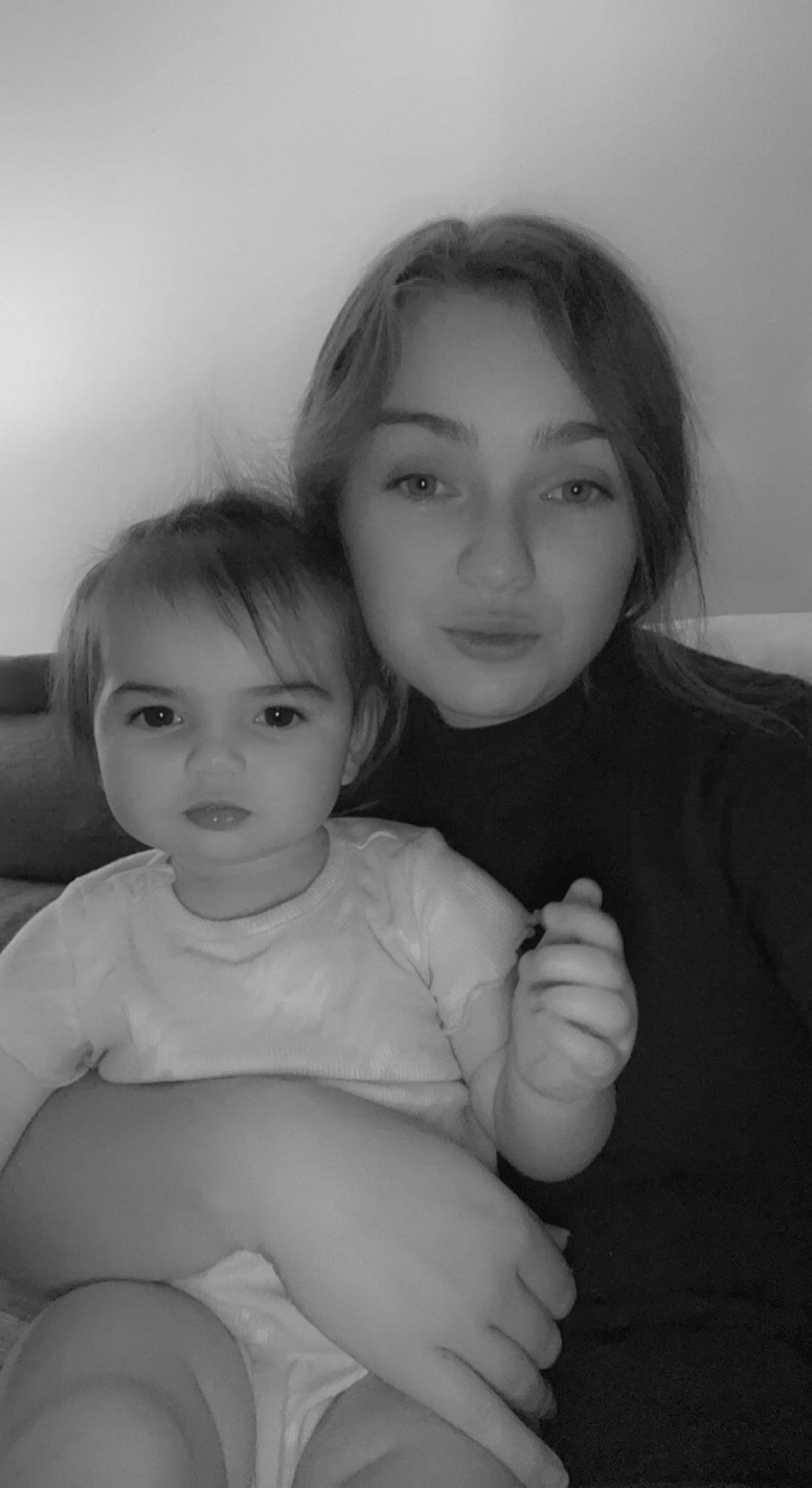 Madilynn is registered to the contest to win money with this photo: arm, baby, black_and_white, cheek, child, eyebrow, face, flash_photography, fun, gesture, hand, happy, iris, lip, monochrome, monochrome_photography, nose, person, style, thumb