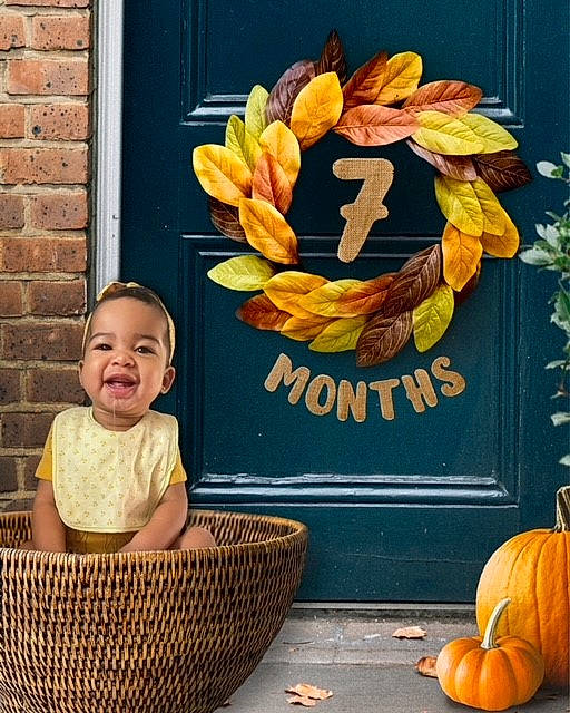 Aubrey joined the competition — help win amazing prizes! baby_toddler_clothing, calabaza, cucurbita, door, fruit, gourd, happy, local_food, natural_foods, orange, person, plant, produce, pumpkin, smile, squash, toddler, vegetable, whole_food, winter_squash