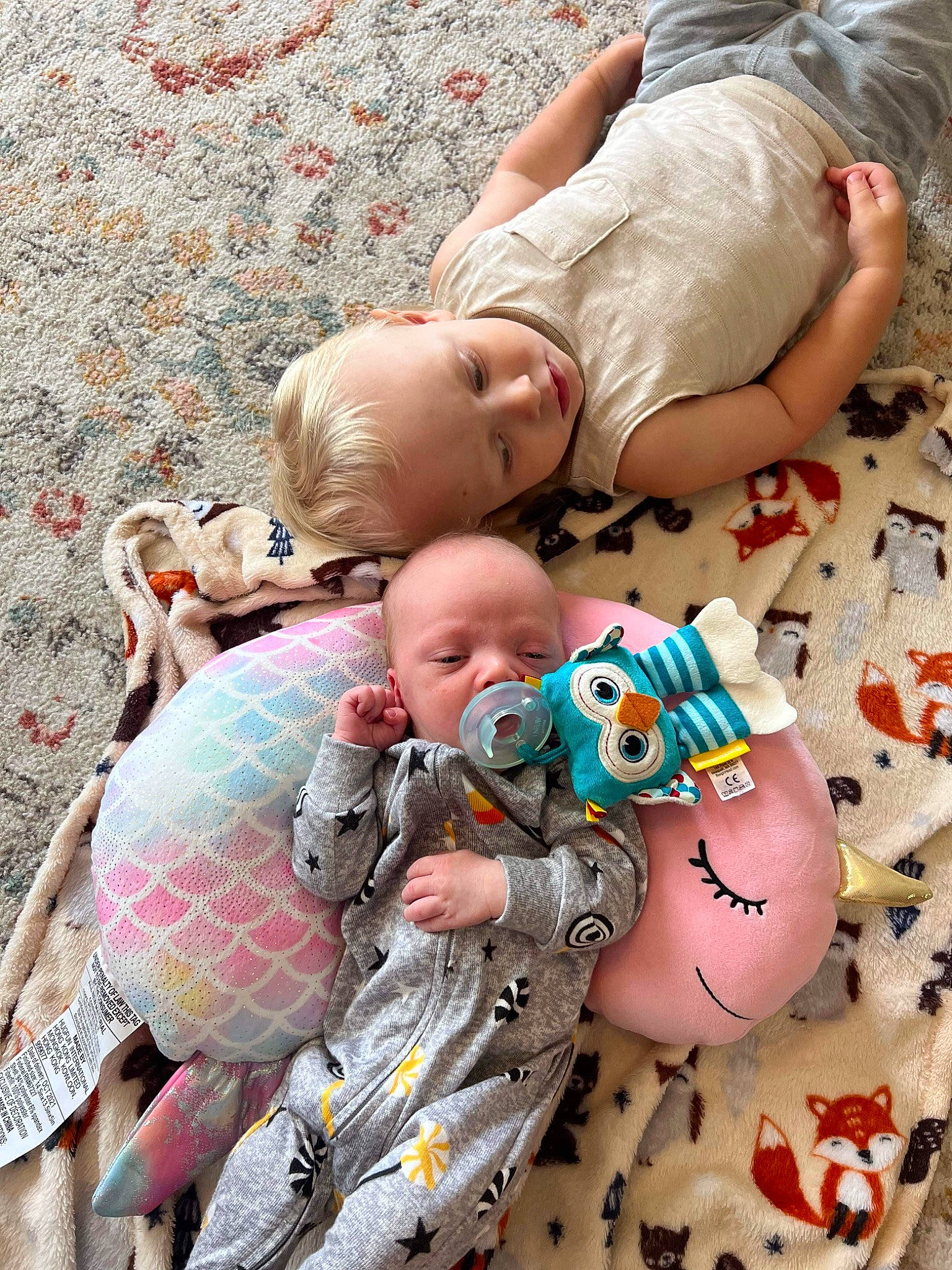 Finnley joined the competition — help win amazing prizes! arm, baby, baby_toddler_clothing, cheek, child, face, fun, grass, happy, head, pattern, people, people_in_nature, person, pink, product, skin, textile, toddler, toy