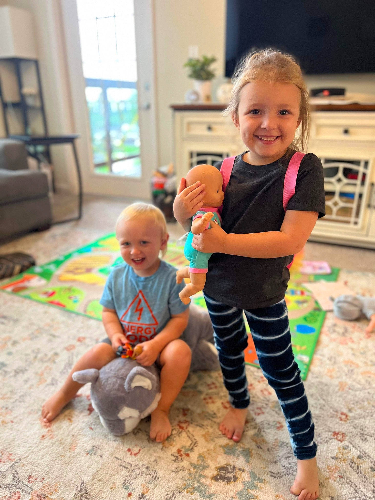 Kaidence joined the competition — help win amazing prizes! baby, baby_toddler_clothing, facial_expression, floor, flooring, fun, happy, human, human_leg, joy, kitchen_appliance, leg, leisure, microwave_oven, person, shorts, smile, standing, t_shirt, thigh