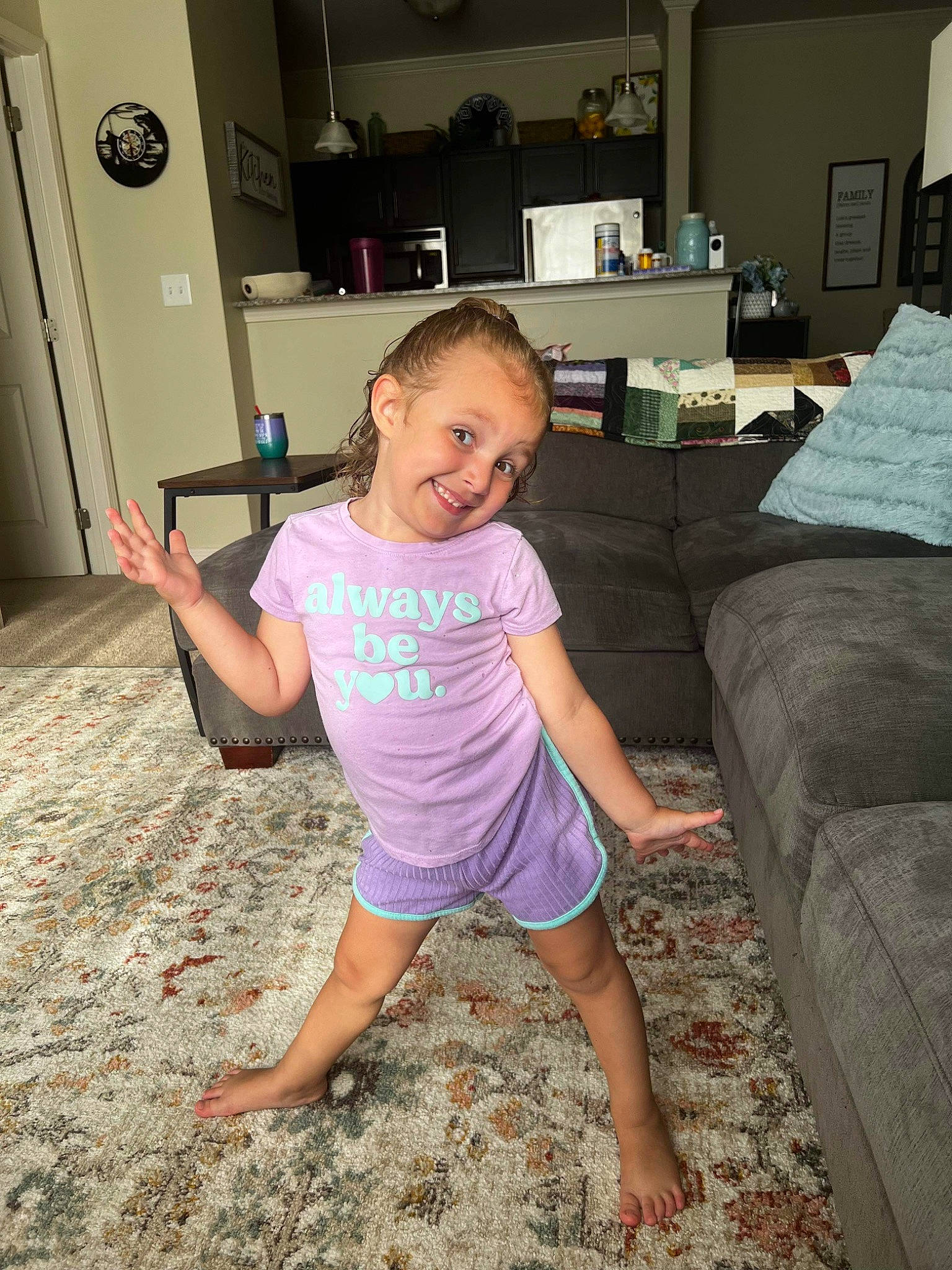 Kaidence is registered to the contest to win money with this photo: barefoot, cabinetry, child, couch, floor, flooring, foot, fun, happy, human_leg, joint, joy, leg, leisure, person, smile, studio_couch, t_shirt, thigh, toddler