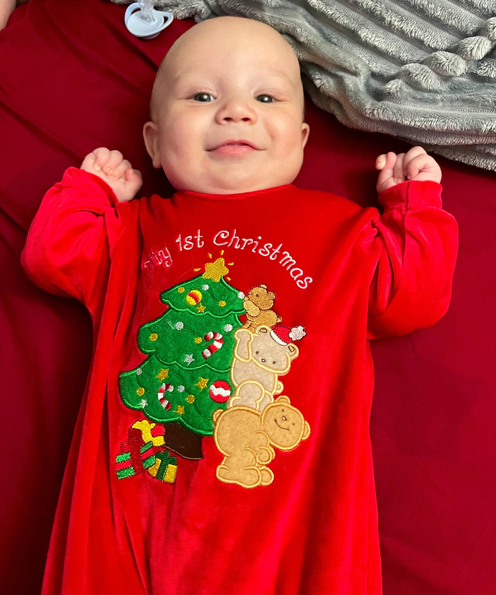Quinton joined the competition — help win amazing prizes! baby, baby_products, baby_toddler_clothing, child, christmas, event, fictional_character, happy, holiday, joy, linens, outerwear, pattern, person, pink, red, skin, sleeve, smile, t_shirt