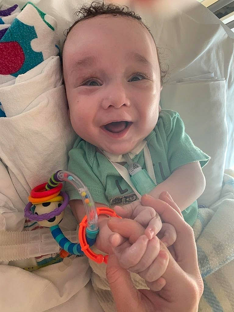 Jorge Jr joined the competition — help win amazing prizes! baby, baby_toddler_clothing, cheek, comfort, eye, face, finger, gesture, hand, happy, head, mouth, nose, person, product, skin, sleeve, smile, textile, thumb