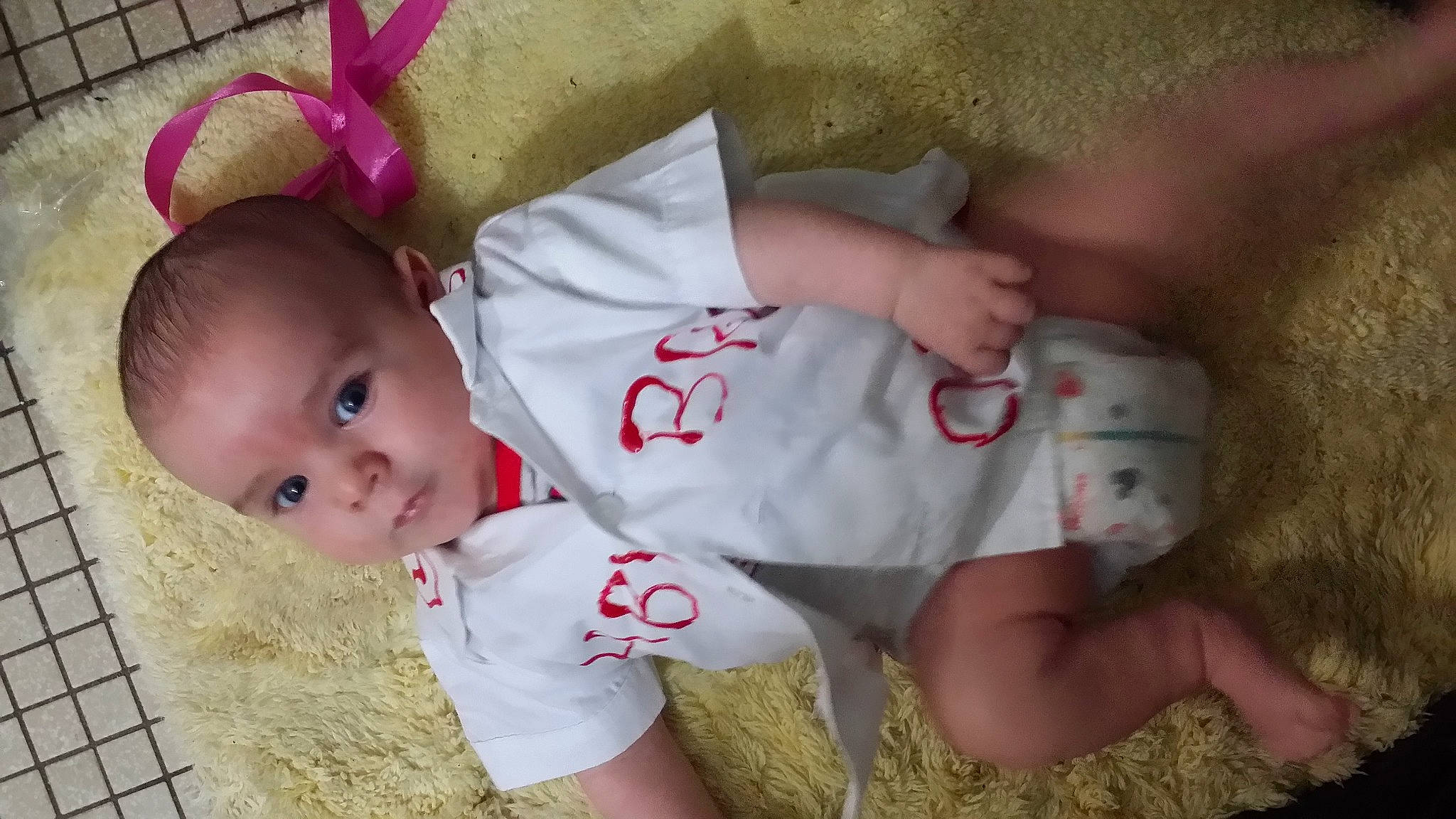 Dakota is registered to the contest to win money with this photo: baby, baby_products, baby_toddler_clothing, cheek, child, finger, mouth, nose, person, product, skin, toddler