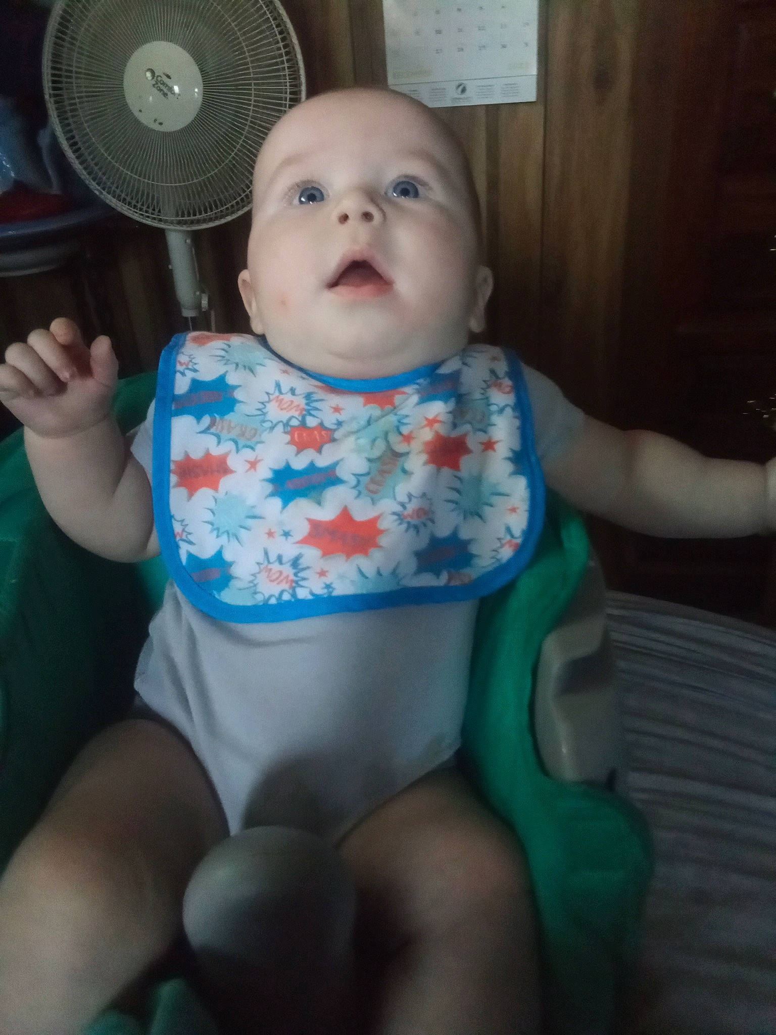 Sean is registered to the contest to win money with this photo: baby, baby_products, baby_safety, baby_toddler_clothing, chair, cheek, child, comfort, fedora, finger, fun, human_leg, lap, mechanical_fan, person, room, sitting, skin, sun_hat, thigh