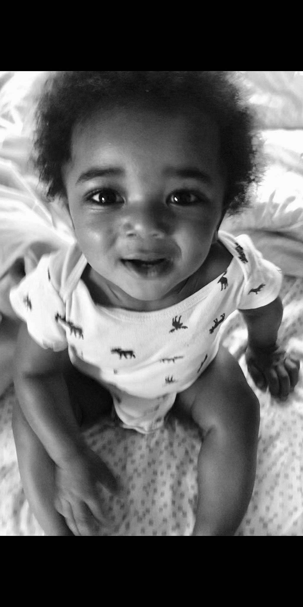 Masen is registered to the contest to win money with this photo: baby, beauty, black, black_and_white, cheek, child, chin, eye, eyebrow, face, facial_expression, head, lip, monochrome, nose, person, photograph, skin, smile, toddler