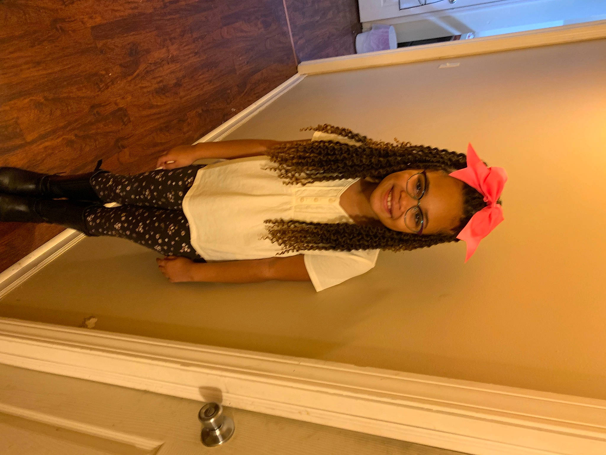 Maliyah is registered to the contest to win money with this photo: beauty, cabinetry, ceiling, comfort, drawer, elbow, fashion_design, flooring, fun, hardwood, hat, human_leg, joy, person, room, shoulder, sleeve, smile, thigh, waist