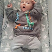 Harry joined the competition — help win amazing prizes! baby, blanket, casual, child, clothing, cute, dinosaur, expression, fabric, green, grey, indoor, infant, laying, pattern, portrait, socks, soft, sweatshirt, young