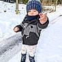 Swann a rejoint le concours — aidez-le/la à gagner de superbes lots ! boots, child, cold_weather, cute, daylight, forest, jacket, knit_hat, nature, outdoor, path, playful, pointing, scarf, snow, standing, toddler, trees, winter, winter_clothing