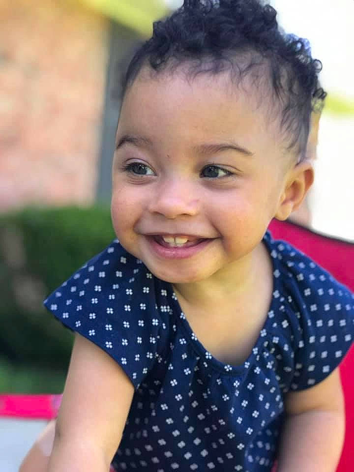 Abby is registered to the contest to win money with this photo: baby, beauty, black_hair, cheek, child, child_model, chin, face, facial_expression, forehead, hair, hairstyle, happy, head, joy, lip, nose, pattern, person, skin