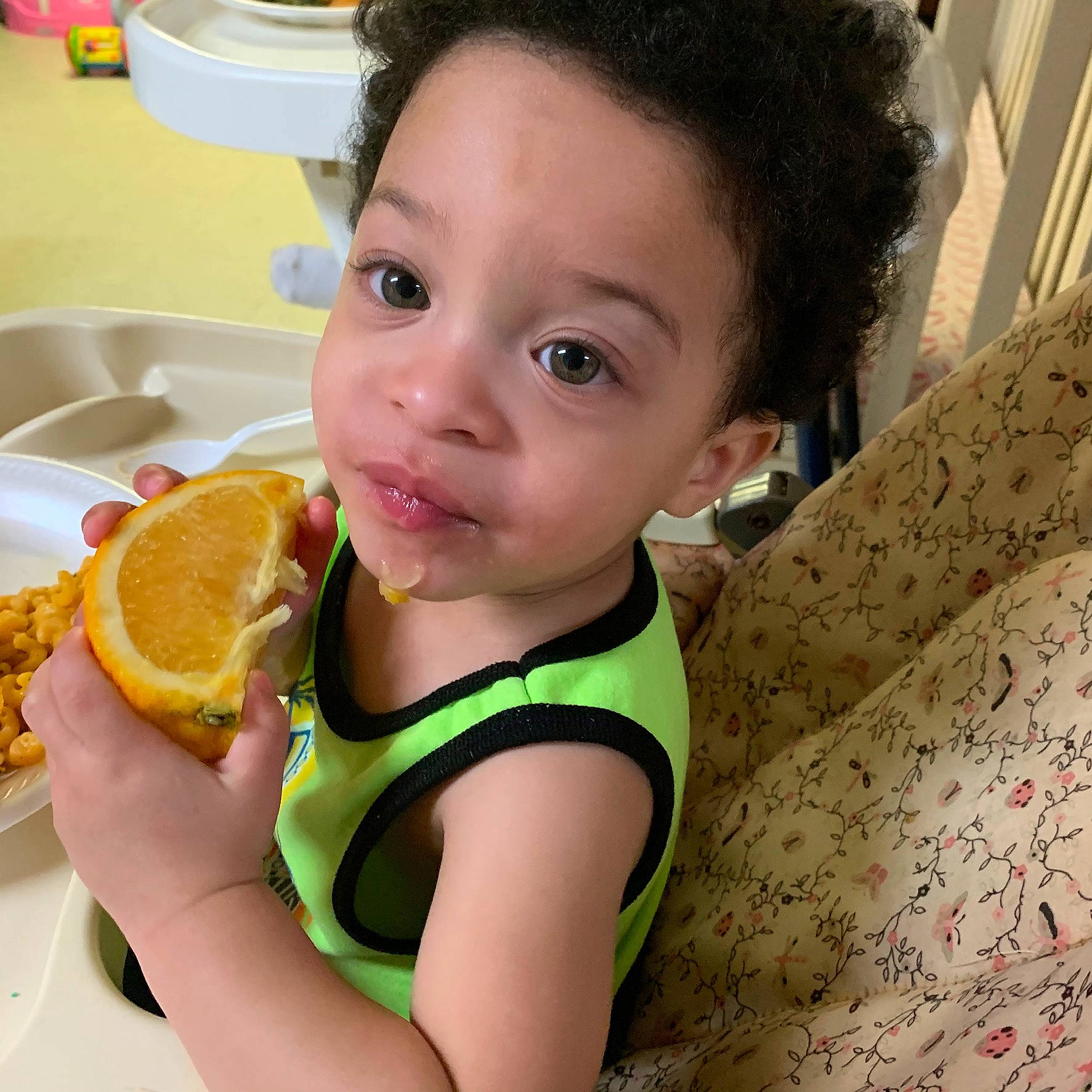 Wyatt is registered to the contest to win money with this photo: baby, child, citrus, ear, eating, food, fruit, meal, neck, person, plant, play, skin, smile, toddler, vegetarian_food