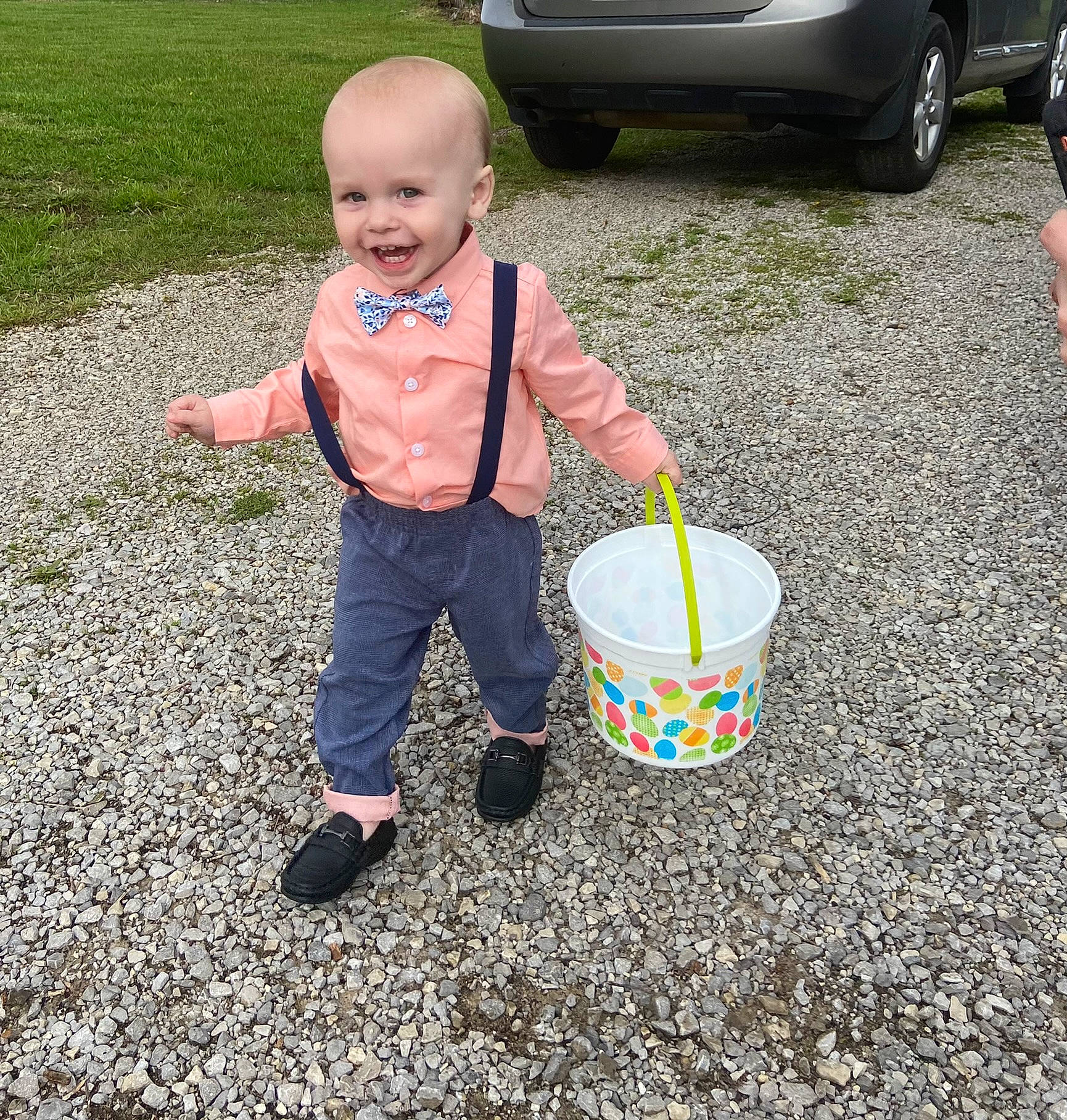 Waylon is registered to the contest to win money with this photo: asphalt, automotive_exterior, automotive_lighting, automotive_tire, child, family_car, fender, fun, grass, joy, lawn, people_in_nature, person, play, smile, soil, tire, toddler, toy, vehicle_door