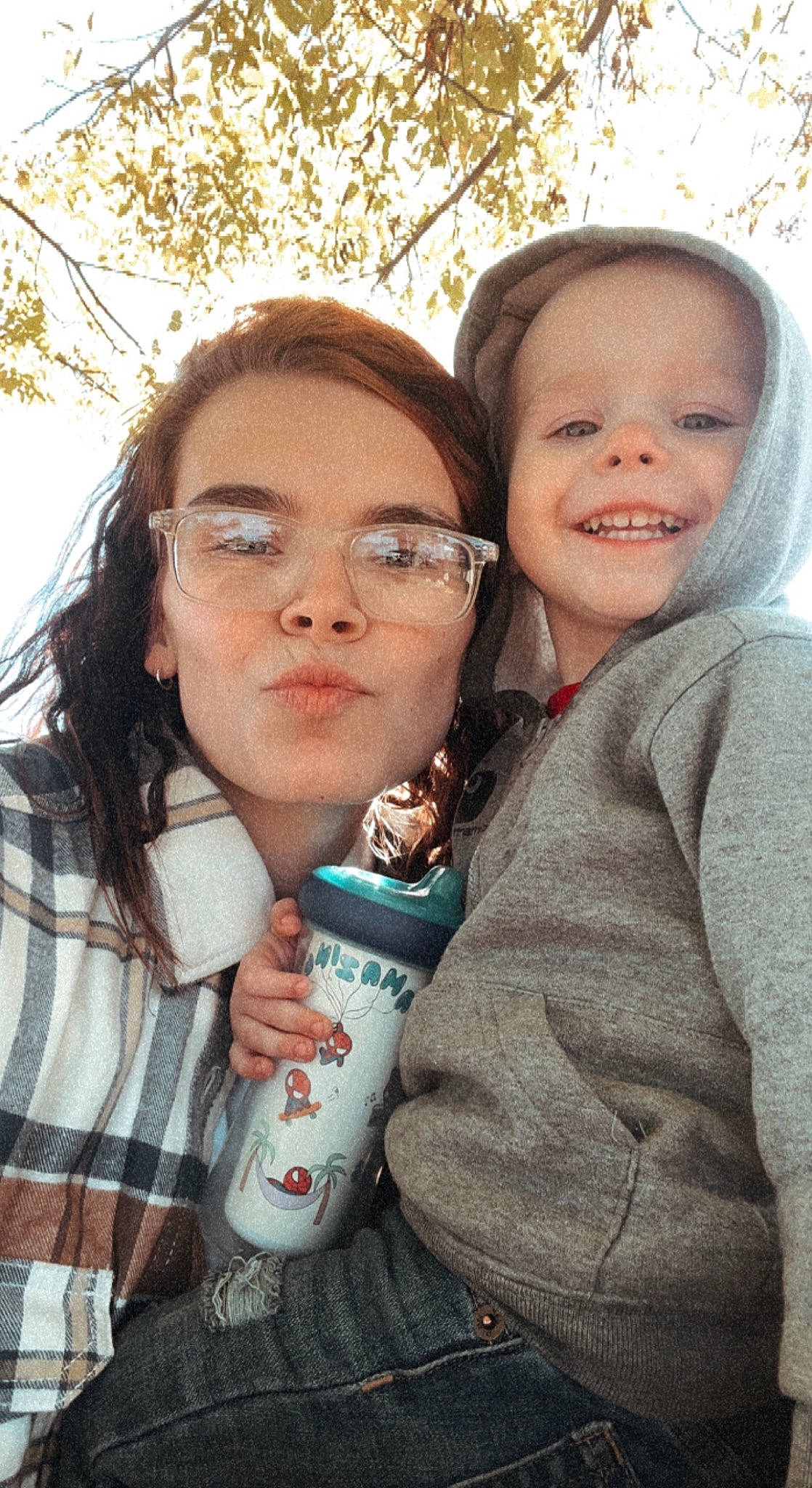 Waylon joined the competition — help win amazing prizes! beauty, child, drink, event, eyewear, friendship, fun, gesture, grass, happy, joy, leisure, lip, outerwear, people_in_nature, person, skin, smile, tartan, toddler