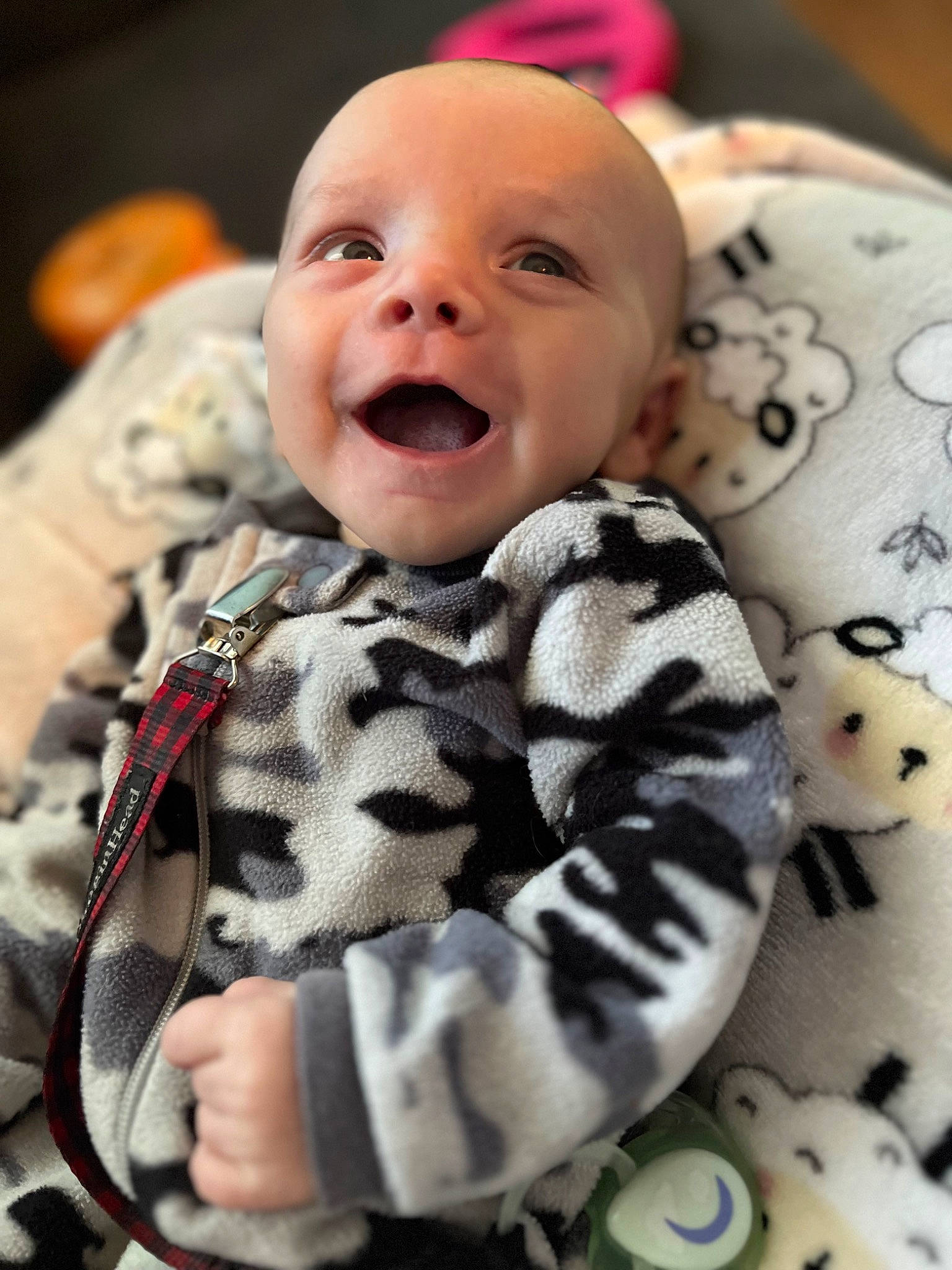Owen is registered to the contest to win money with this photo: baby, baby_laughing, baby_toddler_clothing, cheek, child, comfort, eye, face, facial_expression, happy, head, organ, pattern, person, product, skin, sleeve, smile, textile, toddler