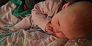 Verity joined the competition — help win amazing prizes! baby, blanket, couch, pacifier, infant, sleepwear, child, soft_toys, fabric, comfort, resting, indoors, person, cute, relaxing, pink_clothing, lying_down, home, young_child, nap_time