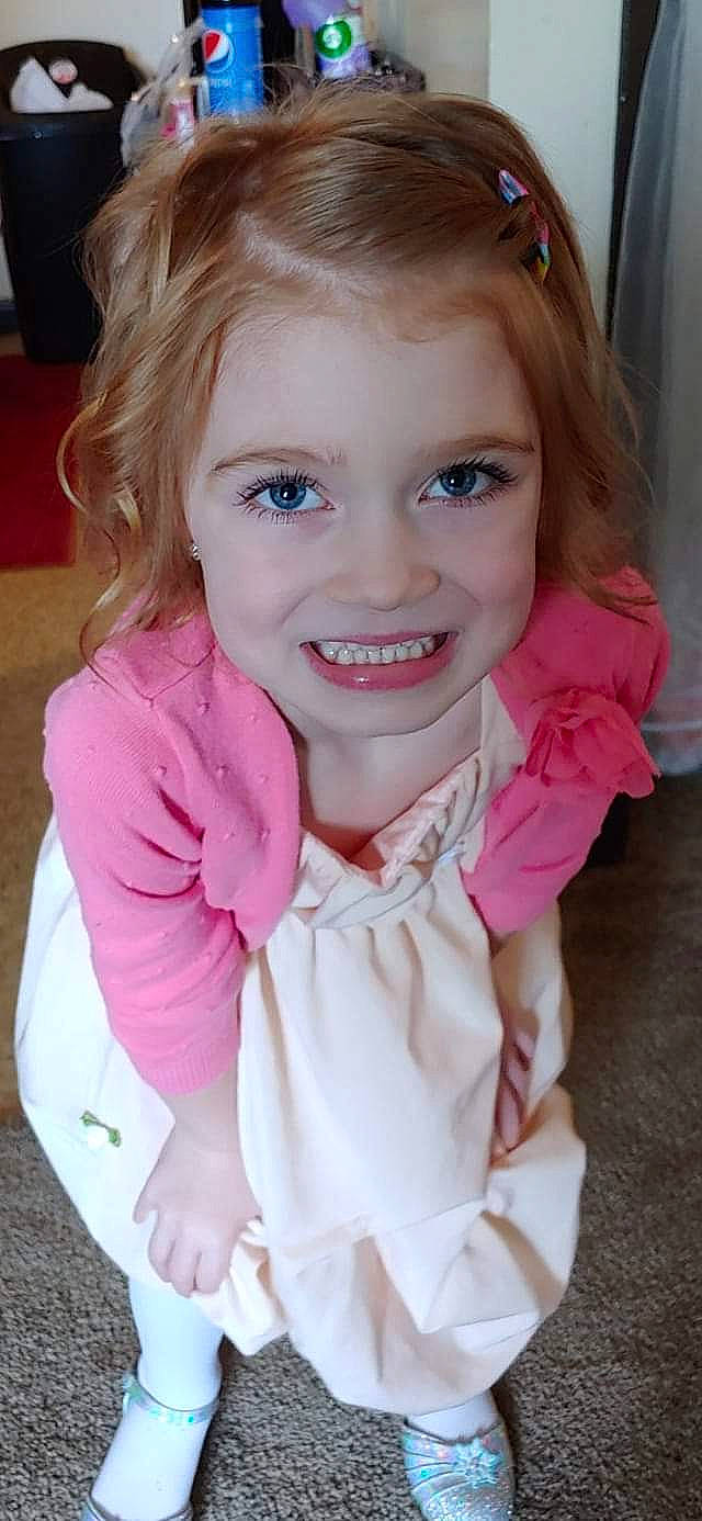 Joella is registered to the contest to win money with this photo: blond, brown_hair, cheek, child, child_model, chin, eye, face, facial_expression, hair, head, iris, joy, lip, person, pink, skin, smile, toddler