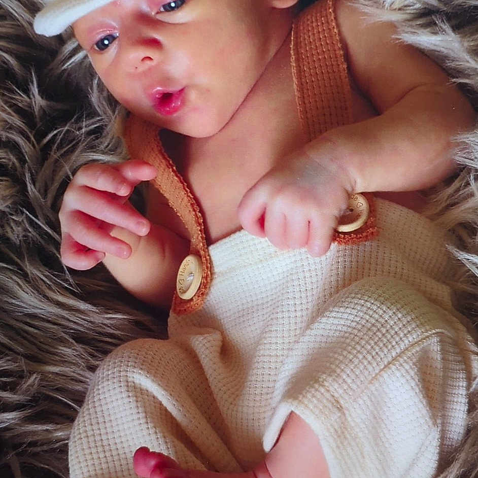 Harvey joined the competition — help win amazing prizes! accessories, baby, baseballcap, bodypart, bracelet, cap, clothing, earring, face, finger, hand, hat, head, jewelry, newborn, person, photography, portrait, ring, sleeping