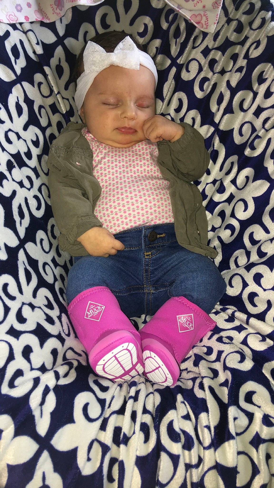 Kinslee is registered to the contest to win money with this photo: baby_products, child, day, design, girl, headgear, infant, pattern, person, pink, product, sitting, skin, textile, toddler