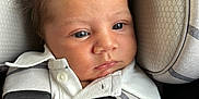 Jaxen joined the competition — help win amazing prizes! baby, blue_eyes, car_seat, child, close_up, clothing, fabric, hair, head_support, infant, infant_seat, padding, person, portrait, safety_harness, seat, seat_belt, serious_expression, straps, white_shirt