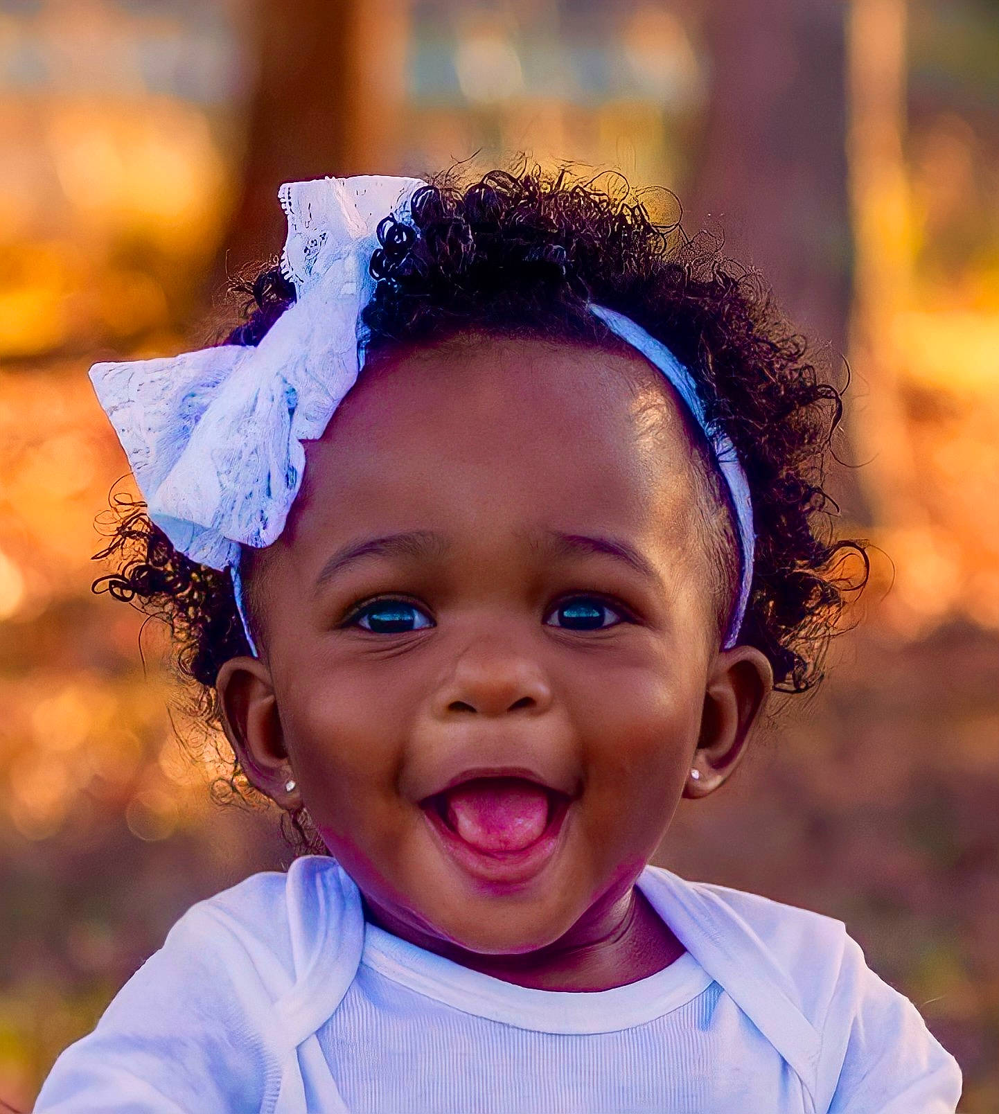 Skylar is registered to the contest to win money with this photo: chin, cool, eye, eyebrow, eyelash, flash_photography, fun, hair, happy, head, headgear, human_body, iris, lip, people_in_nature, person, photograph, skin, smile, toddler