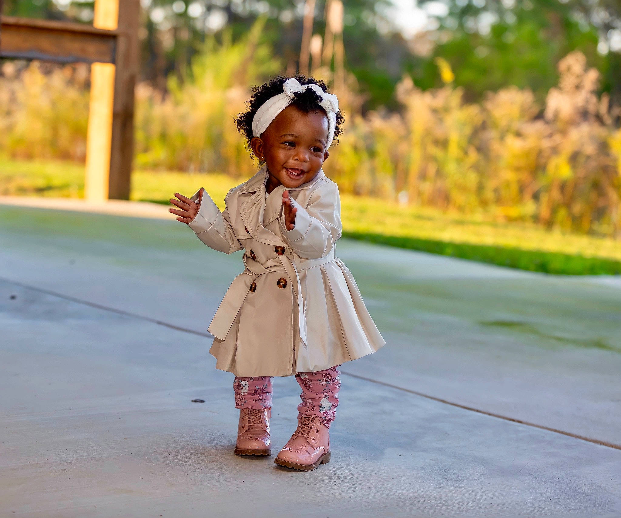 Skylar is registered to the contest to win money with this photo: baby_toddler_clothing, child, face, fashion_accessory, footwear, fun, grass, happy, hat, joy, leaf, leisure, person, plant, recreation, skin, sleeve, smile, street_fashion, sun_hat