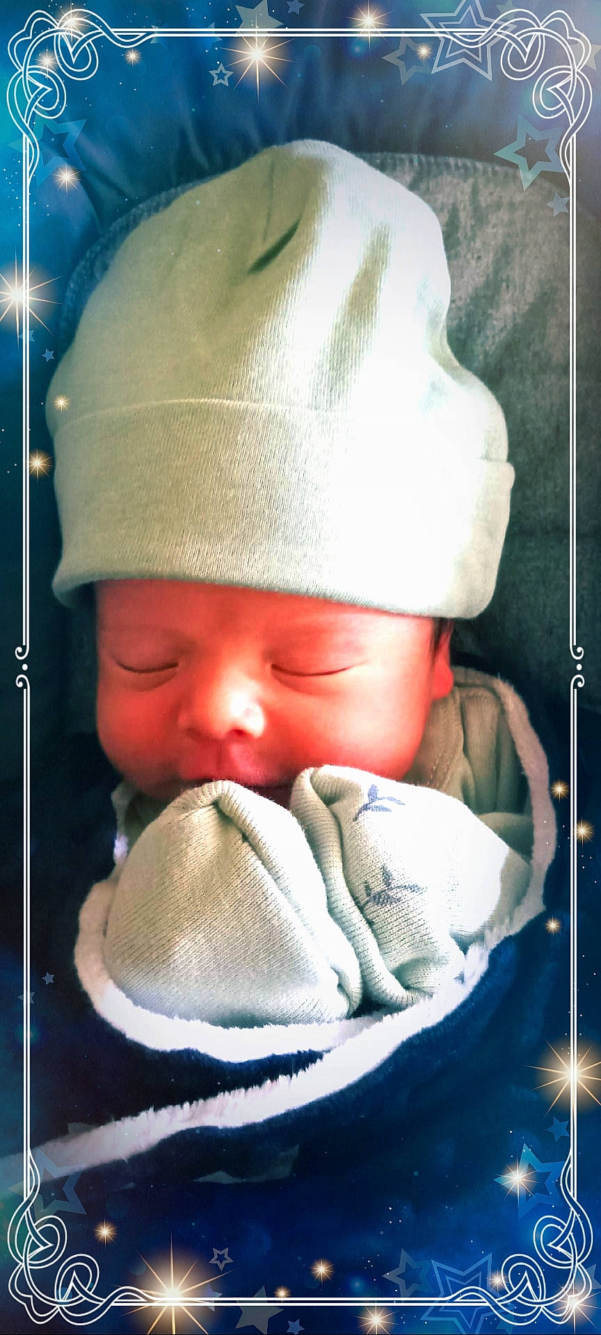 Nicko is registered to the contest to win money with this photo: baby, baby_sleeping, baby_toddler_clothing, cap, cheek, chin, comfort, eyebrow, face, happy, headgear, headwear, knit_cap, lip, mouth, nose, person, photograph, skin, textile