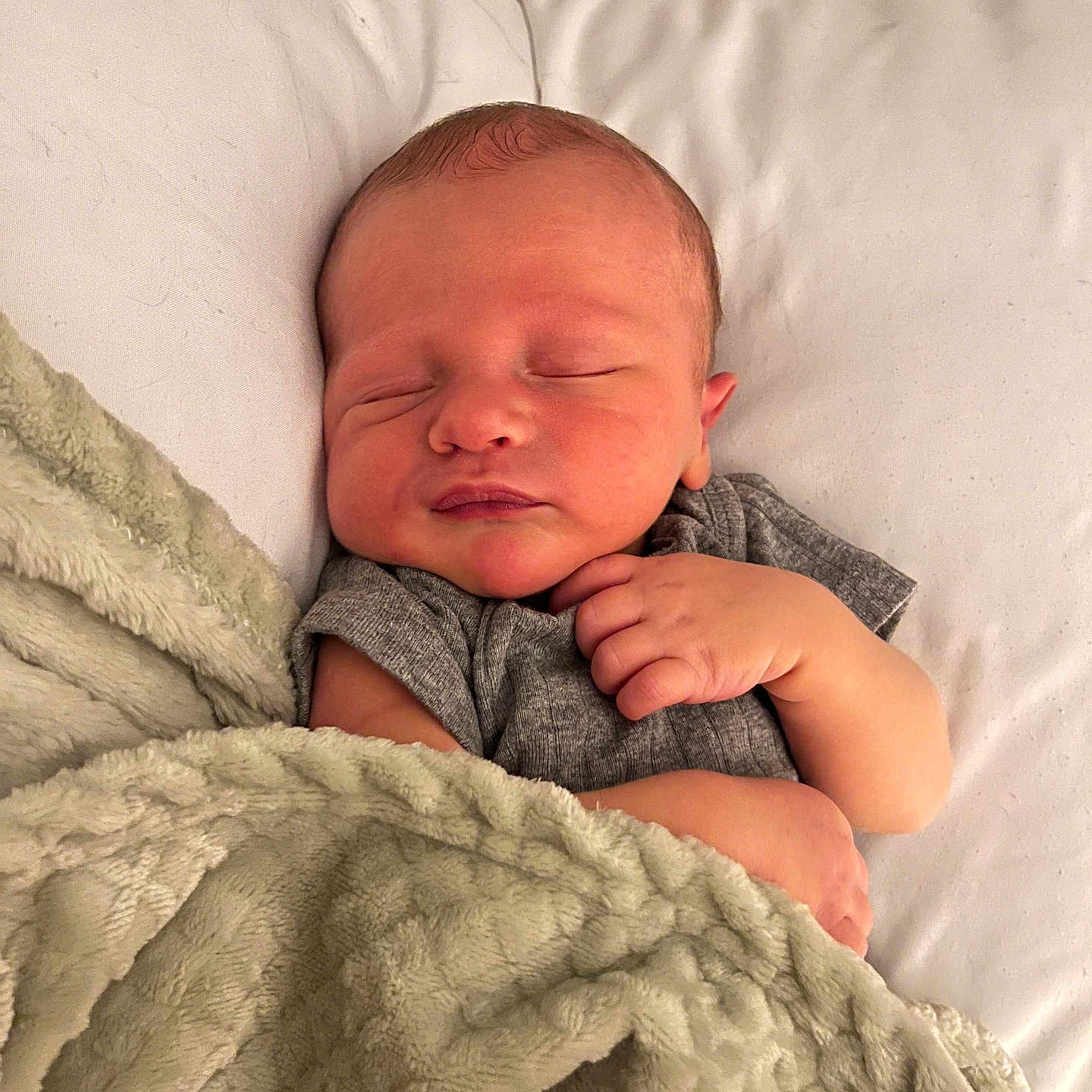 Brooks joined the competition — help win amazing prizes! baby, blanket, child, closeup, cozy, cute, face, hand, indoors, infant, newborn, peaceful, pillow, quiet, resting, skin, sleeping, soft, warm, wrapped