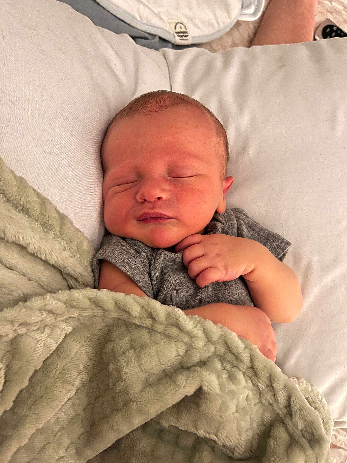 Brooks joined the competition — help win amazing prizes! newborn, baby, sleeping, blanket, soft, cozy, infant, pillow, cute, peaceful, closeup, child, resting, indoors, wrapped, warm, skin, face, hand, quiet