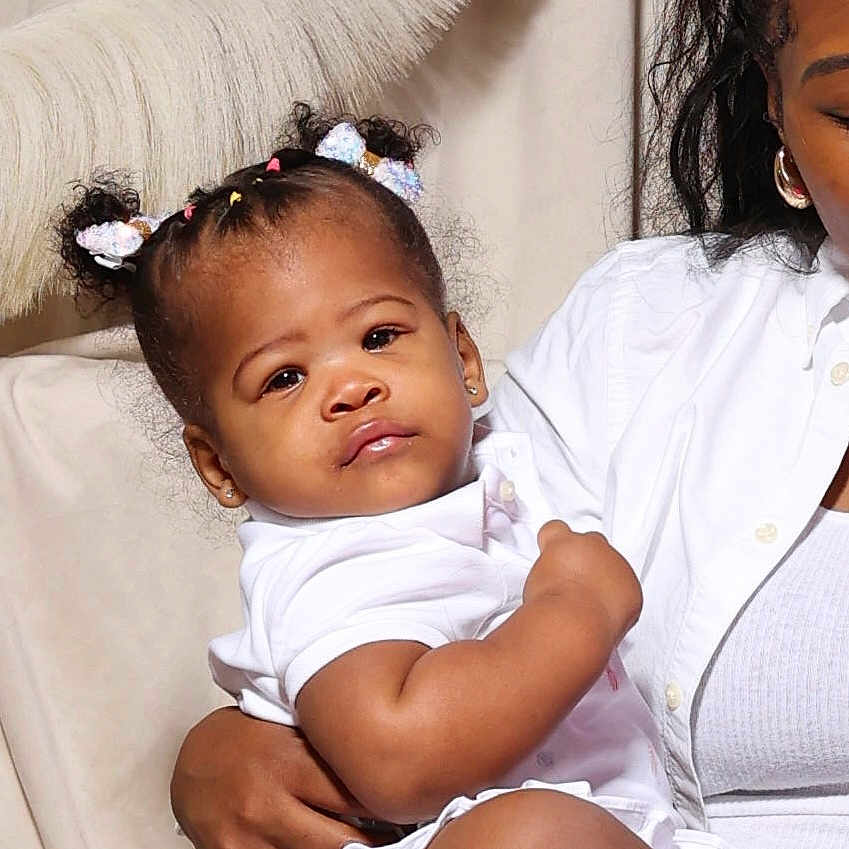 Naomi joined the competition — help win amazing prizes! baby, bed, bedroom, clothing, couch, cushion, face, footwear, furniture, head, homedecor, indoors, jeans, newborn, pants, person, photography, portrait, shoe, sitting