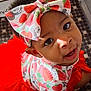 Saniyah Heaven is registered to the contest to win money with this photo: baby, infant, toddler, headband, bow, strawberry_pattern, red_tutu, dress, eyes, smile, portrait, indoor, playmat, hand, fingers, eyelashes, cute, hair, skin, sitting