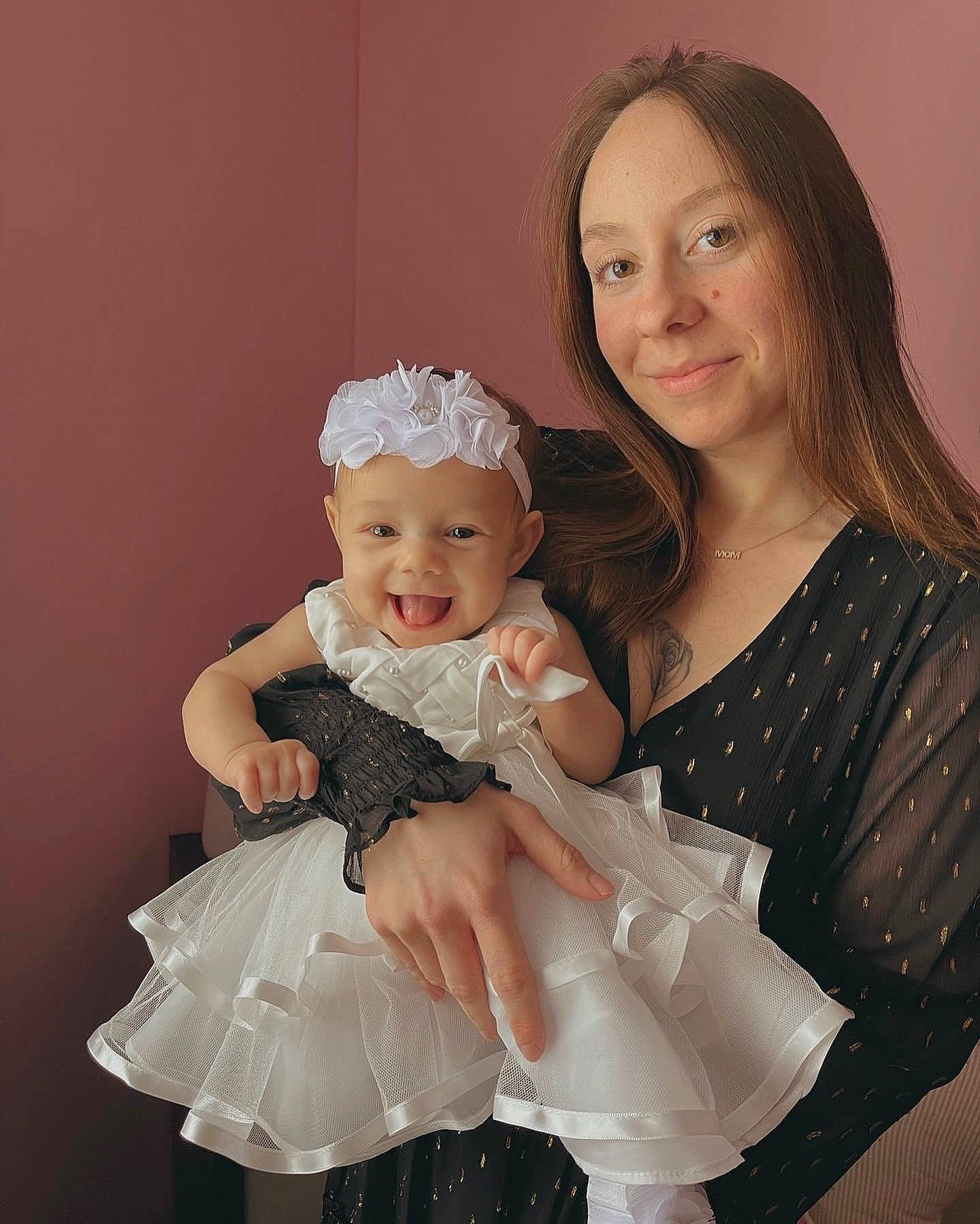 Nova is registered to the contest to win money with this photo: baby_toddler_clothing, bridal_accessory, child, day_dress, dress, embellishment, event, flash_photography, formal_wear, fun, gown, hair_accessory, happy, headband, headpiece, headwear, iris, jewellery, joy, person