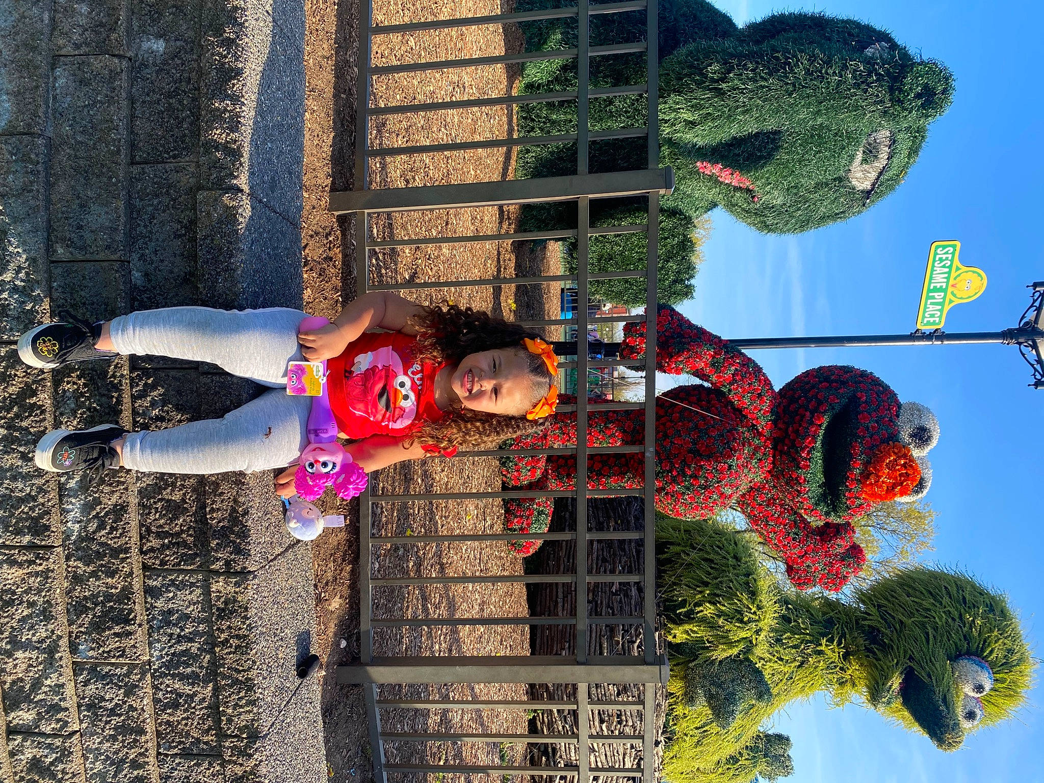 Jaylianie is registered to the contest to win money with this photo: animation, art, facade, fun, joy, leisure, magenta, person, tree, urban_design, world