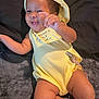 Jaylani joined the competition — help win amazing prizes! baby, infant, yellow_outfit, hat, smiling, reaching_hand, lying_down, blanket, soft_texture, cute, happy, chubby_legs, white_socks, indoors, child, portrait, playful, toddler, one_person, casual_clothing