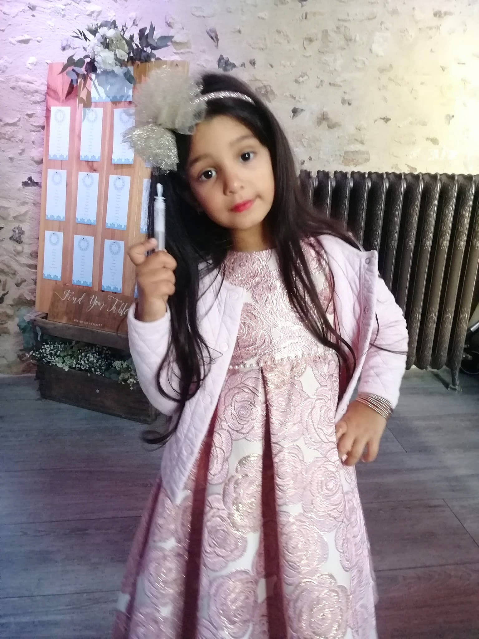 Lara participe au concours pour gagner de l'argent avec cette photo : beauty, black_hair, child, clothing, day_dress, dress, embellishment, fashion_design, flash_photography, formal_wear, happy, headpiece, headwear, long_hair, neck, person, pink, shoulder, skin, sleeve