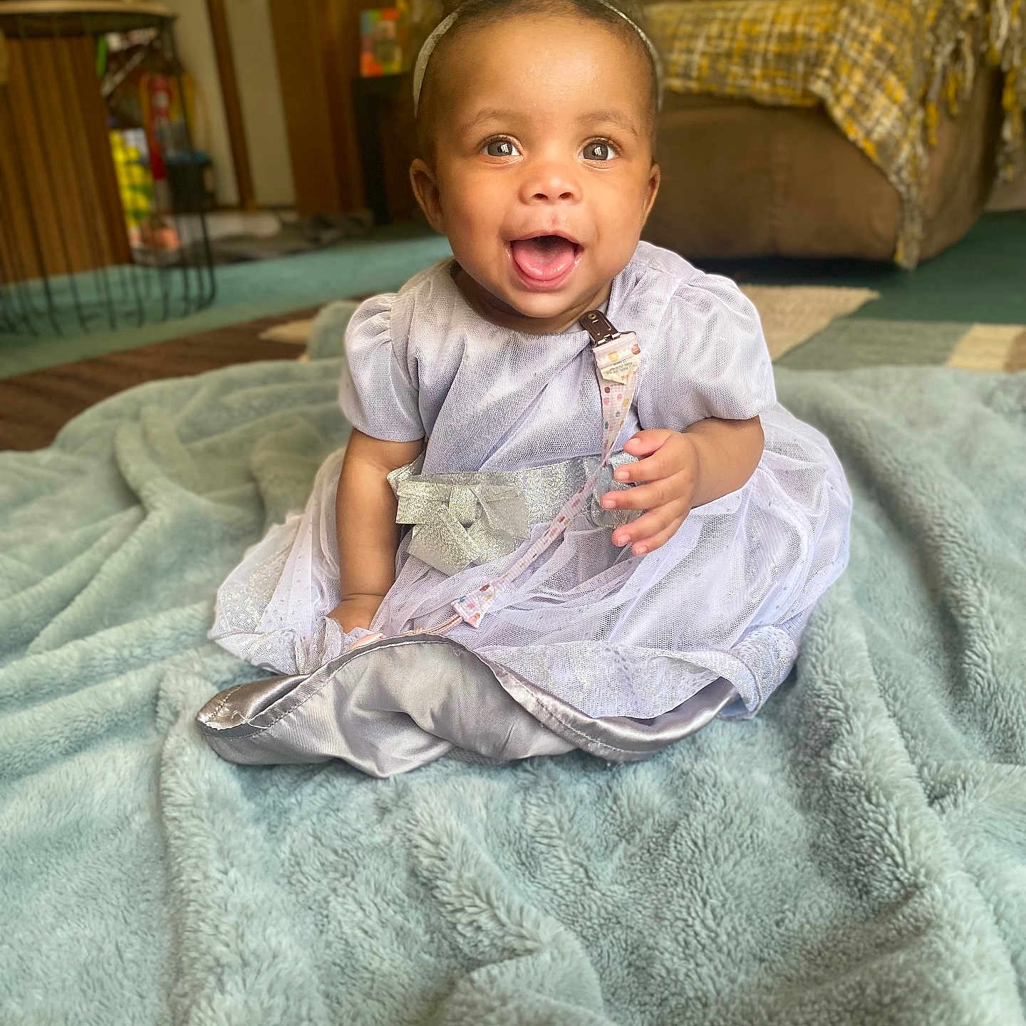 Siyah is registered to the contest to win money with this photo: baby, babylaughing, bed, bedroom, blanket, clothing, couch, dress, face, furniture, happy, head, indoors, pants, person, photography, portrait, quilt, room, sitting