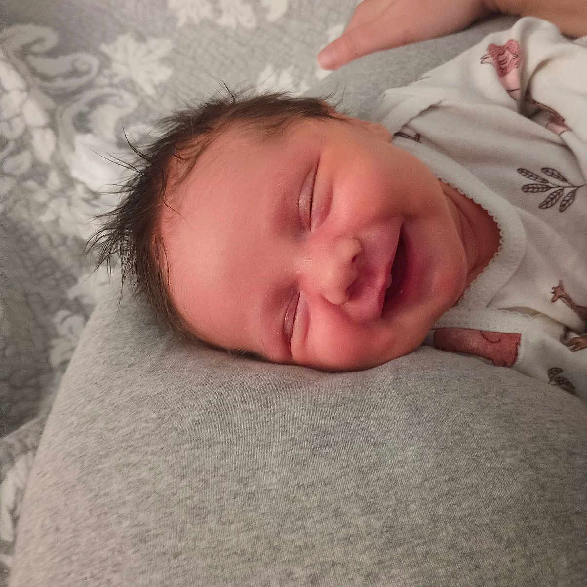 Zoë joined the competition — help win amazing prizes! architecture, baby, bed, bedroom, blanket, building, clothing, cushion, face, furniture, glove, happy, head, homedecor, hospital, indoors, laughing, newborn, person, photography