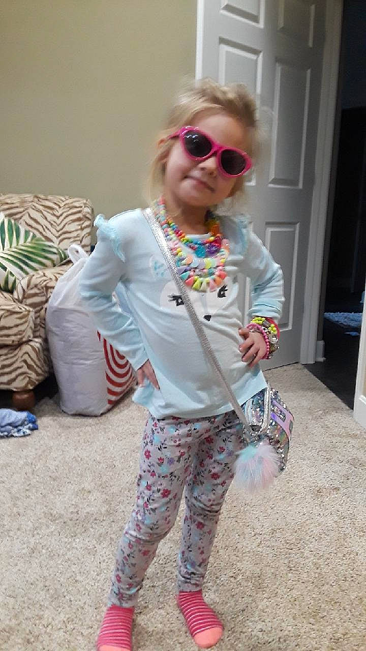 Holland joined the competition — help win amazing prizes! blazer, child, clothing, cool, eyewear, fashion, fashion_accessory, glasses, jacket, outerwear, pajamas, person, pink, shoe, sleeve, style, sunglasses, trousers, vision_care